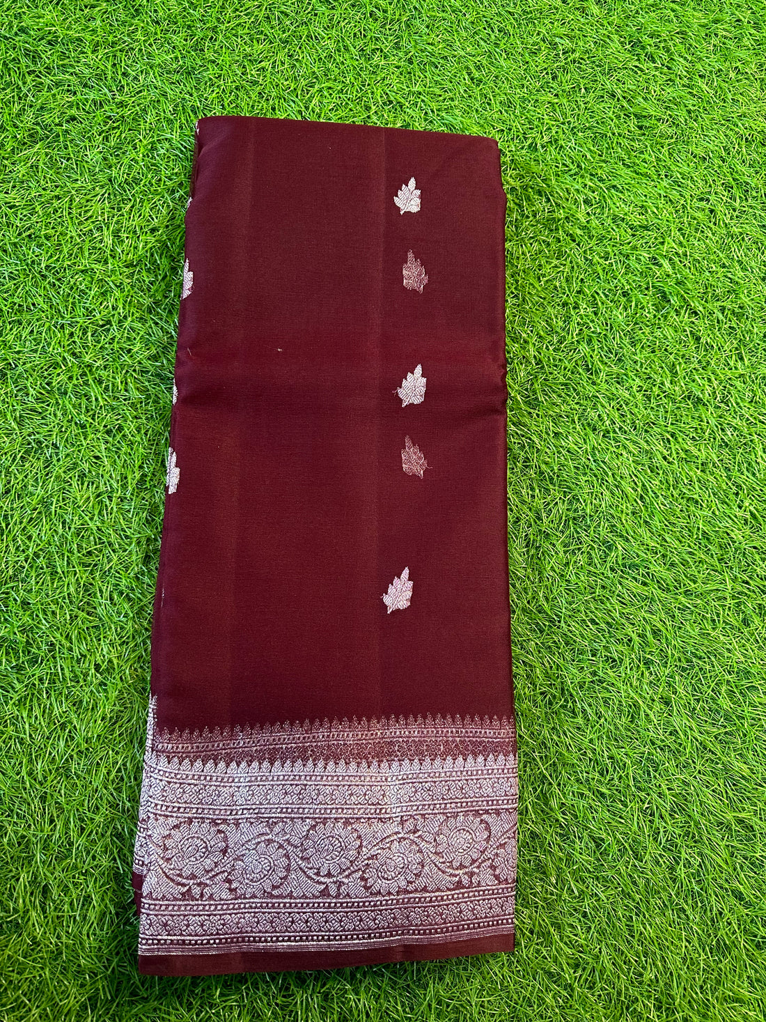 Chocolate brown pure khaddi chiffon Banarasi sarees.