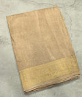Cream Kanchi border plain modal silk saree