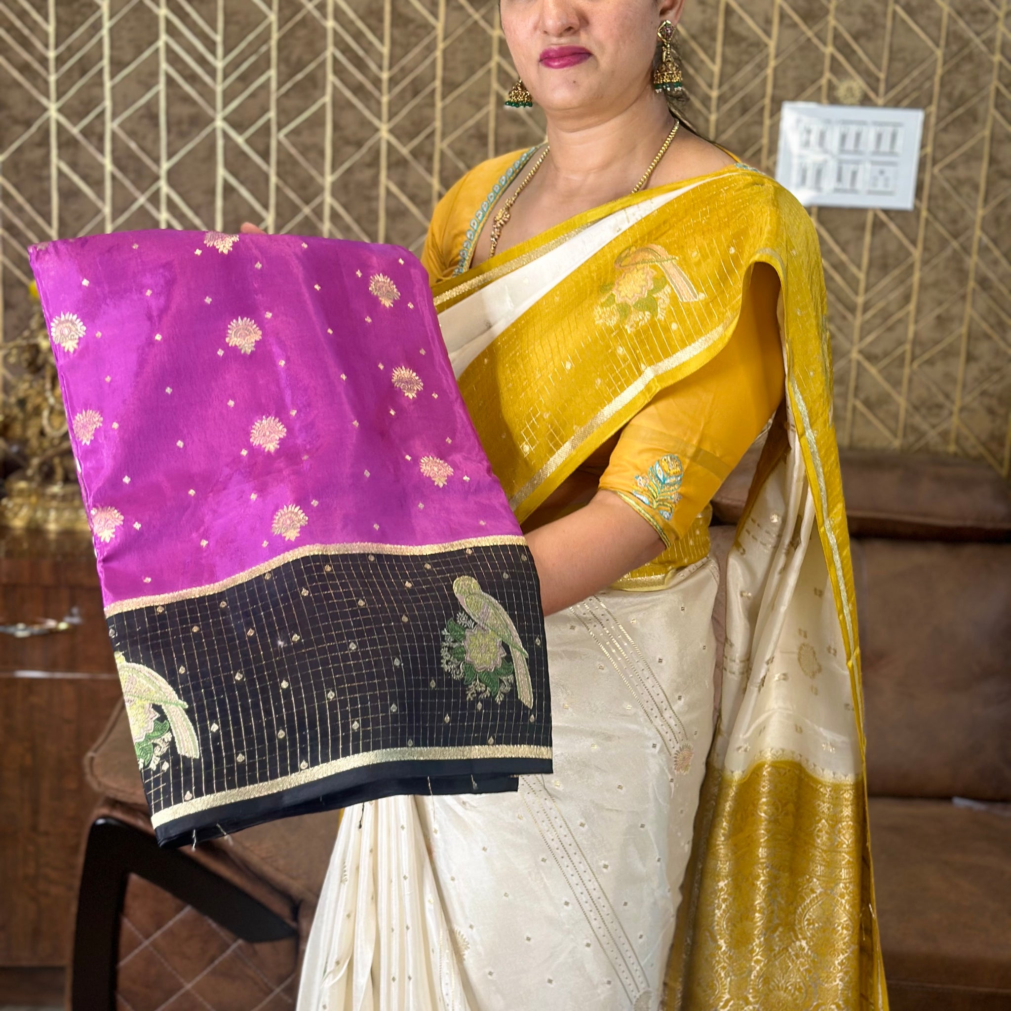 Black and pink dola silk saree with checks border.