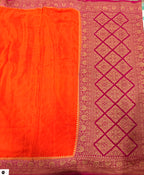 Orange n Rani pink partly pallu pure benarasi crepe silk saree