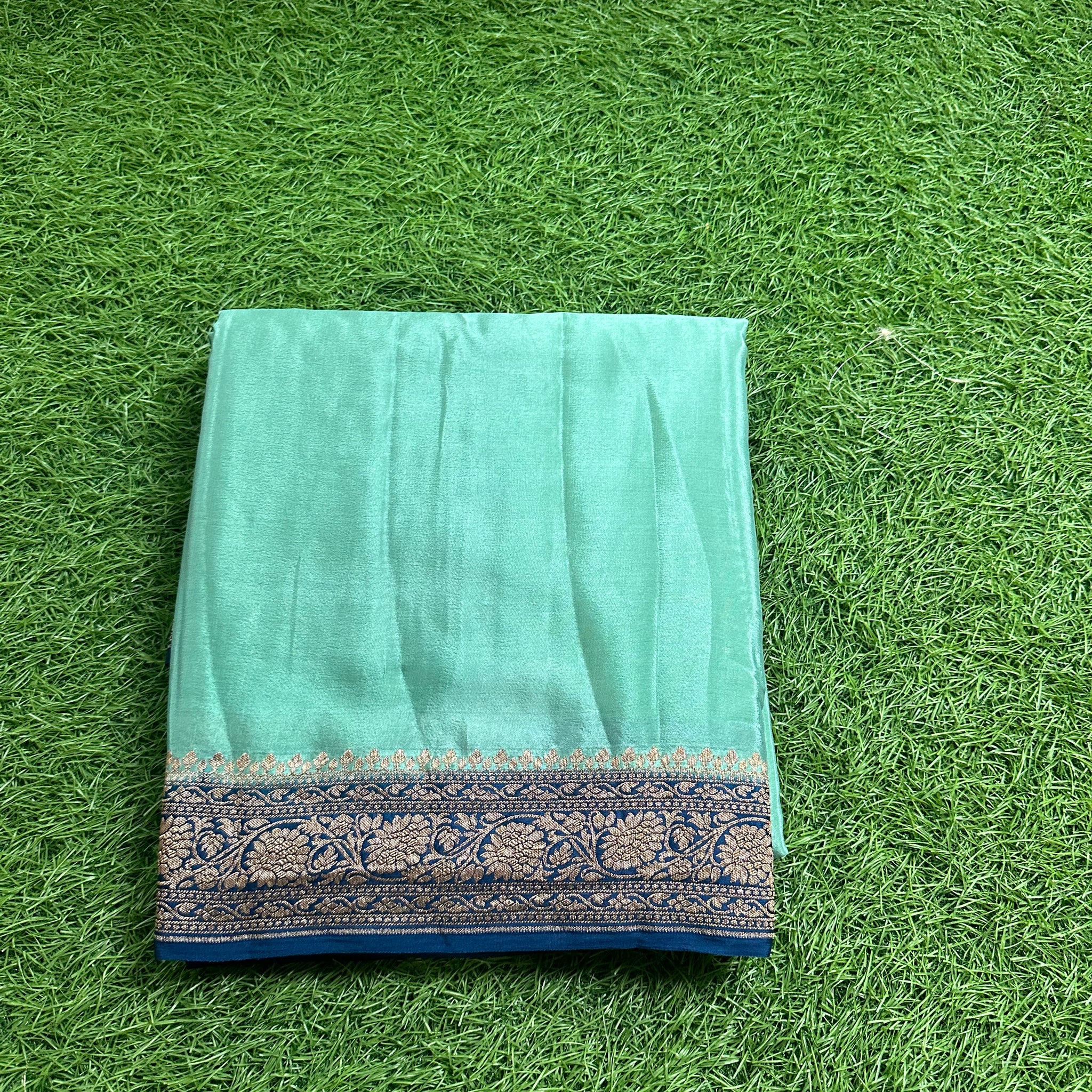 Olive green and purple pure crepe Banaras plain with brocade blouse.