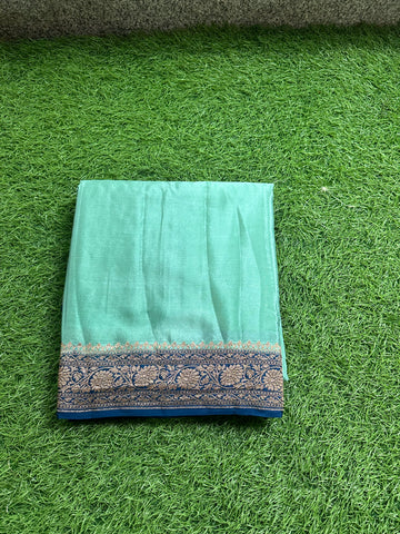 Olive green and purple pure crepe Banaras plain with brocade blouse.