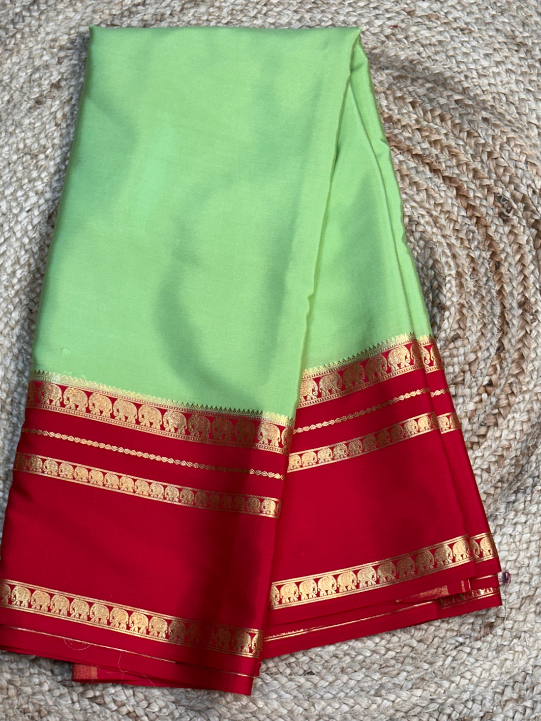 Pista green with red pure Mysore silk crepe with elephant bentex border