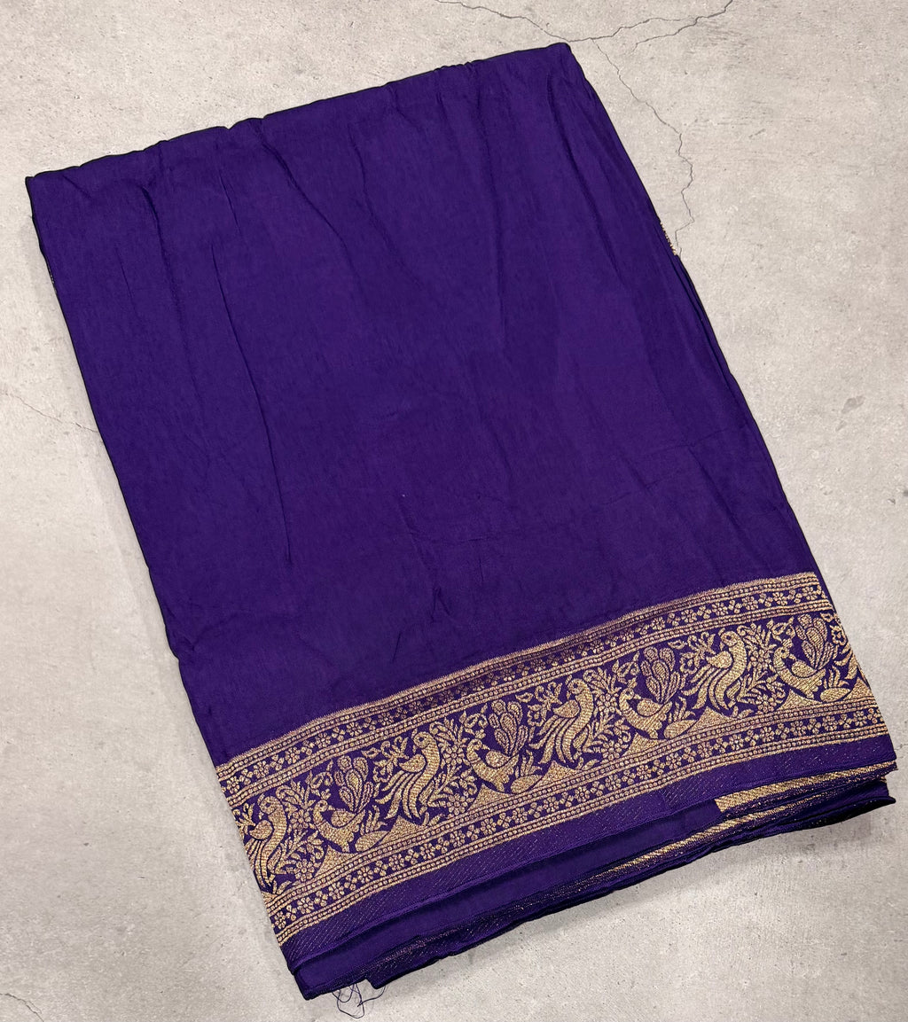 Purple Kanchi border plain modal silk saree