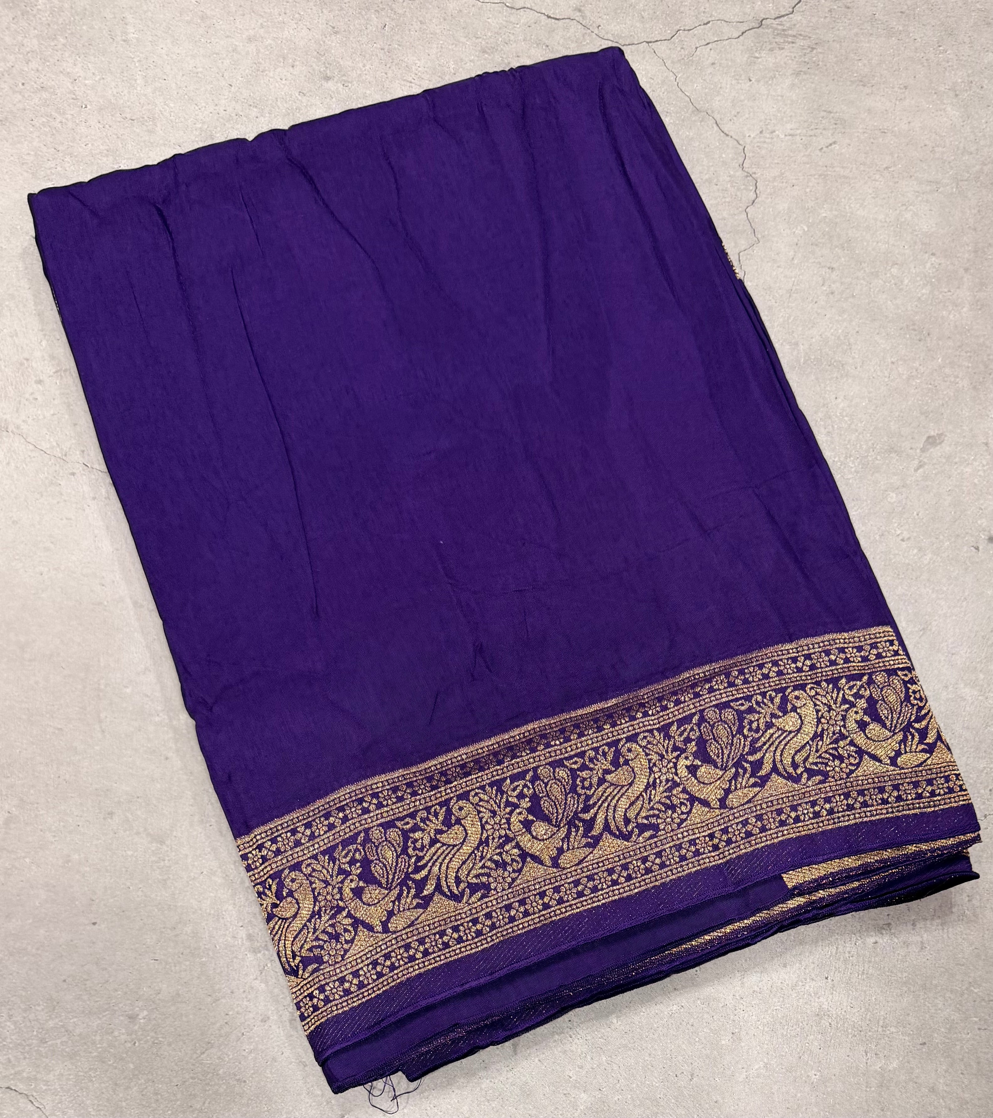 Purple Kanchi border plain modal silk saree