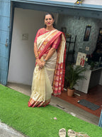 Tusser with Patola weaving Contrast border.half white with pink.