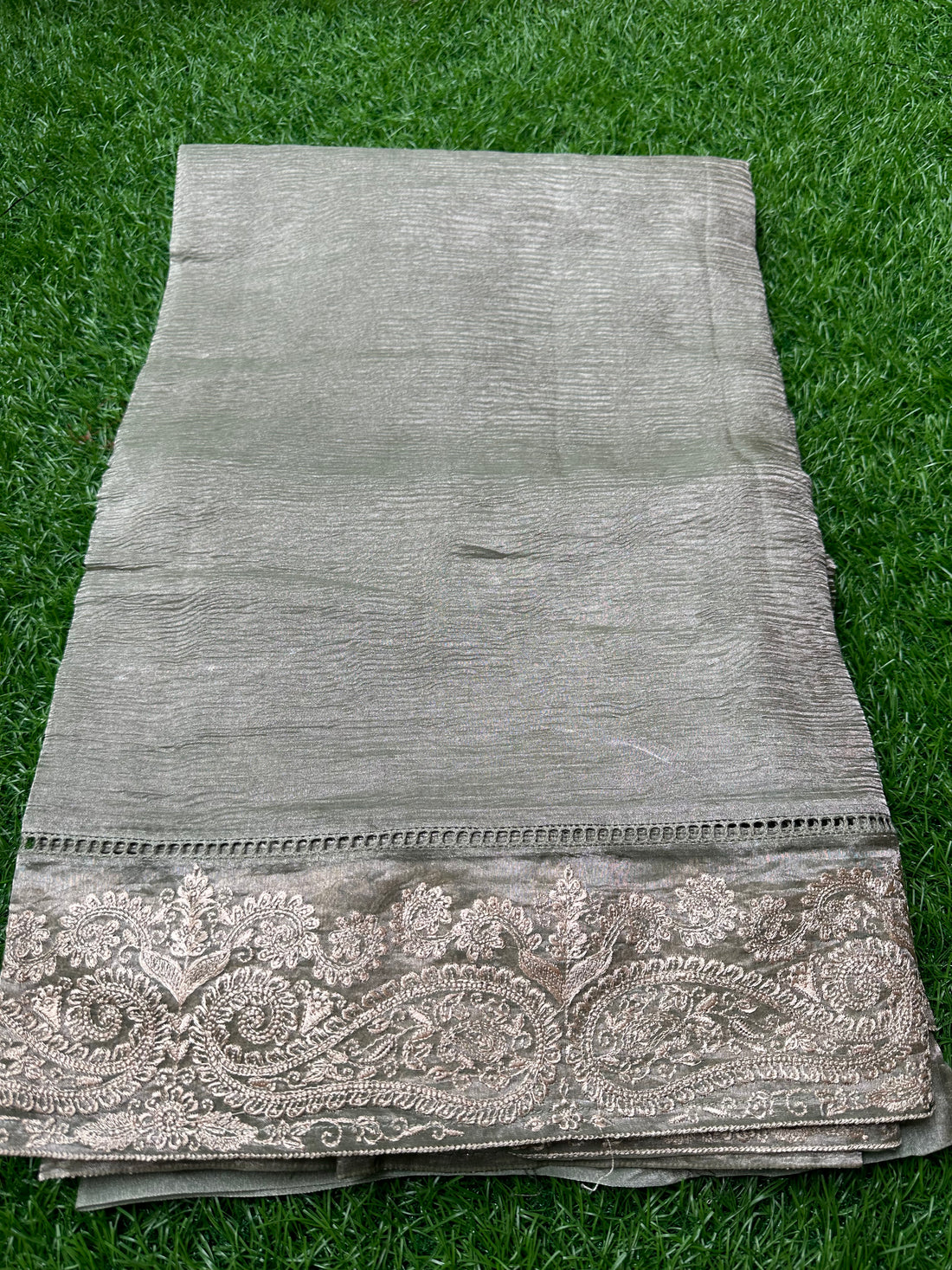 Pistha green pure tissue Banarasi with embroidery borders.