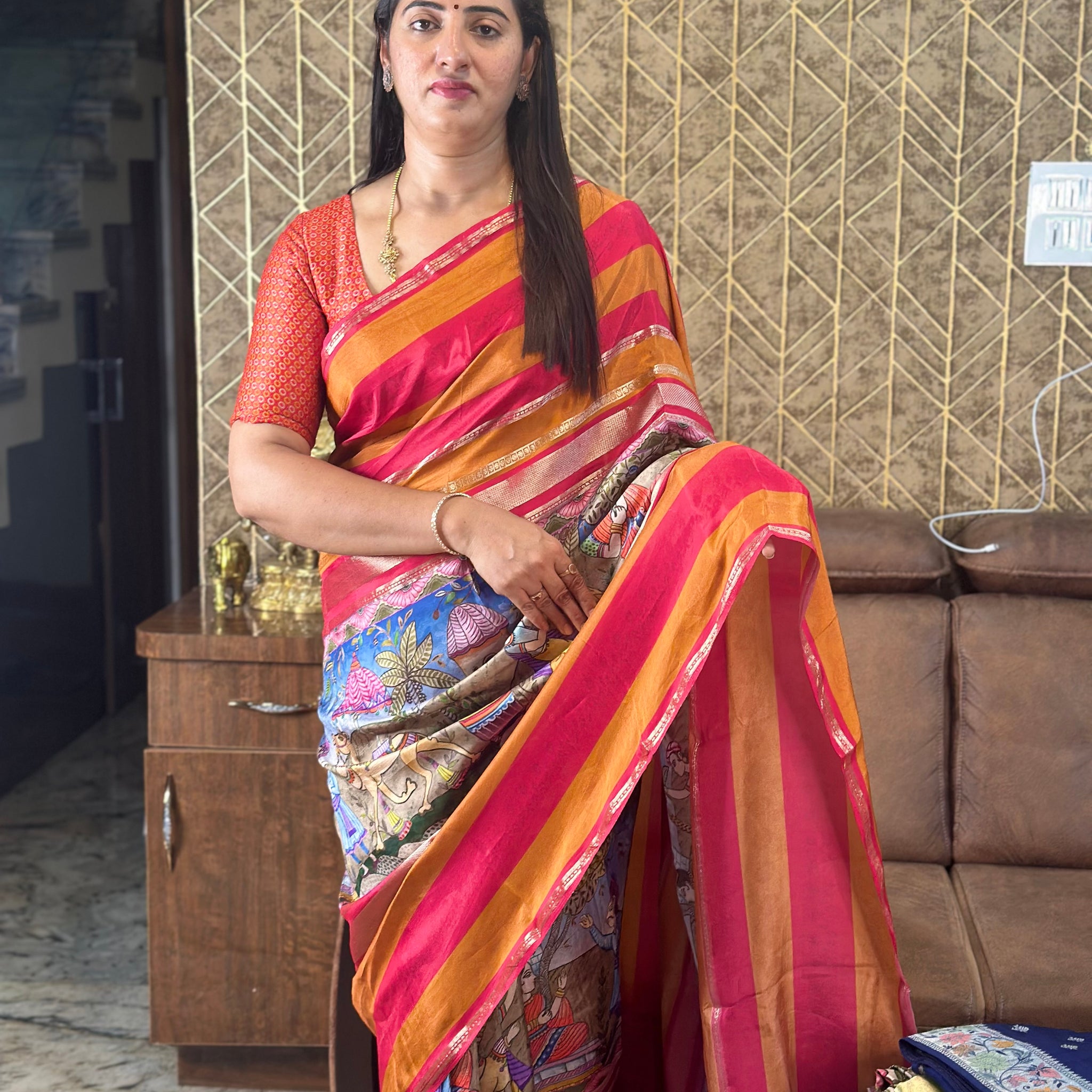 Red and orange semi crepe digital kalamkari prints.