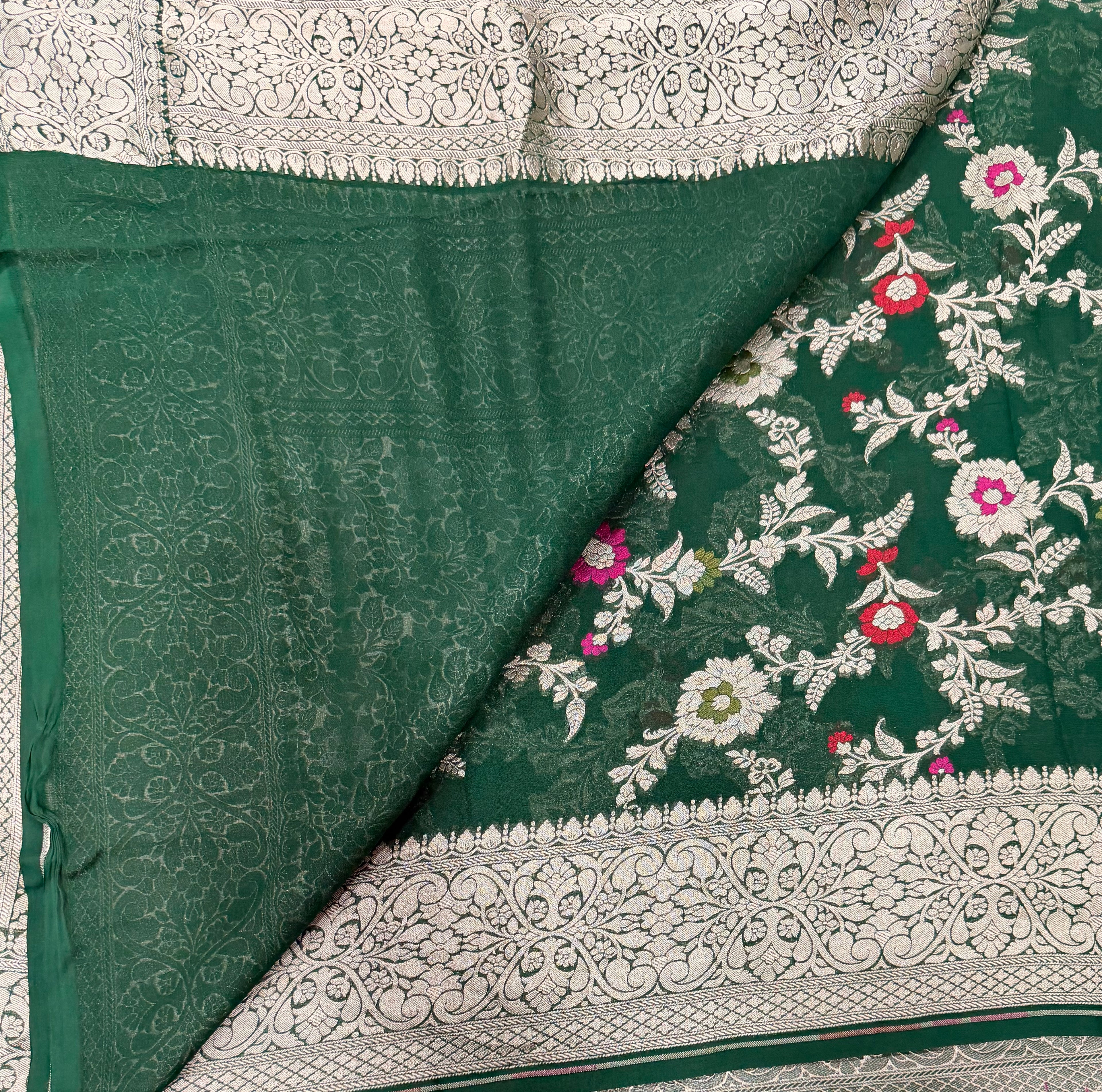Bottle green jaal pattern pure georgette with water zari saree
