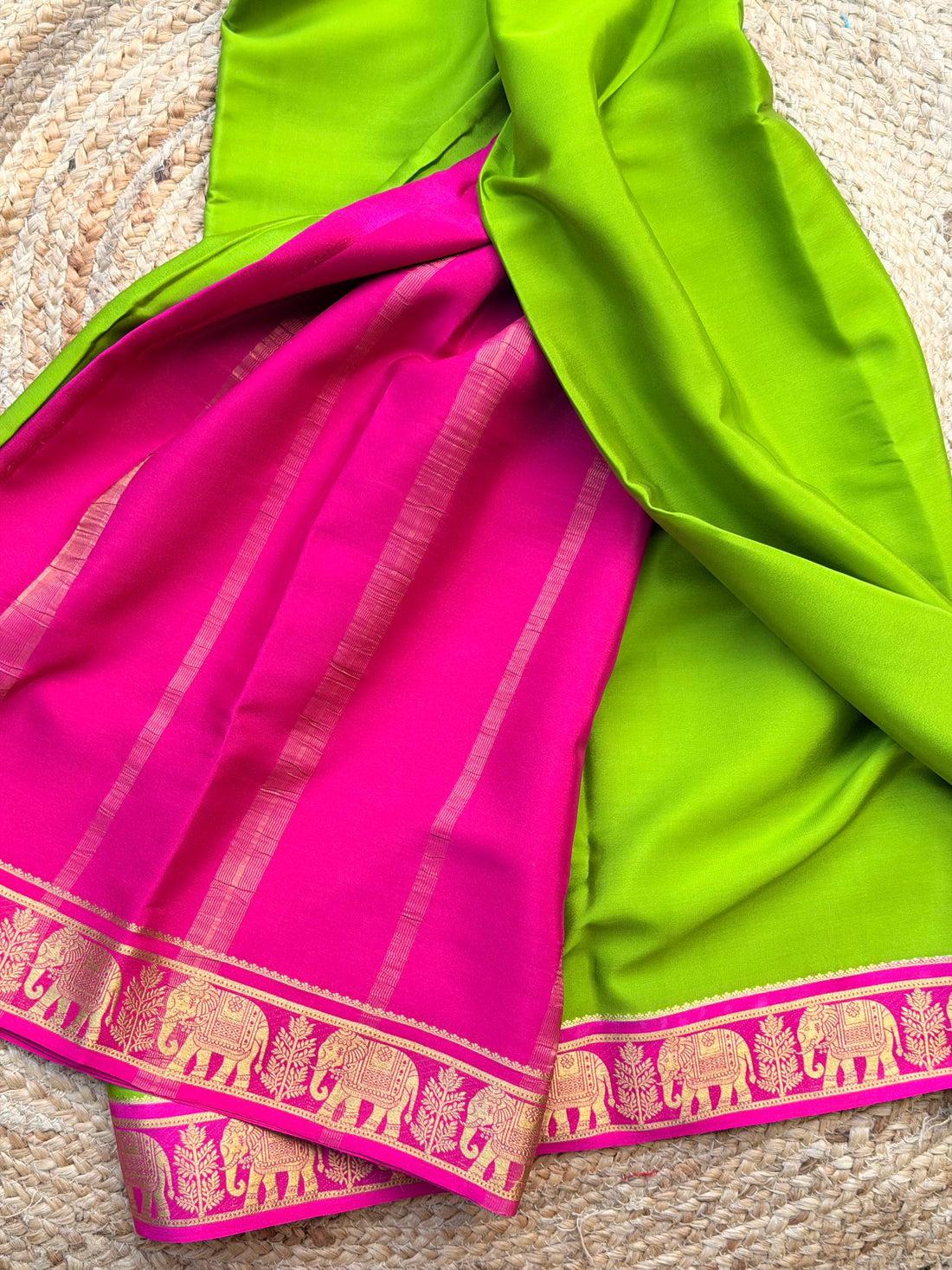 Green and pink elephant border crepe Mysore silk 120gsm