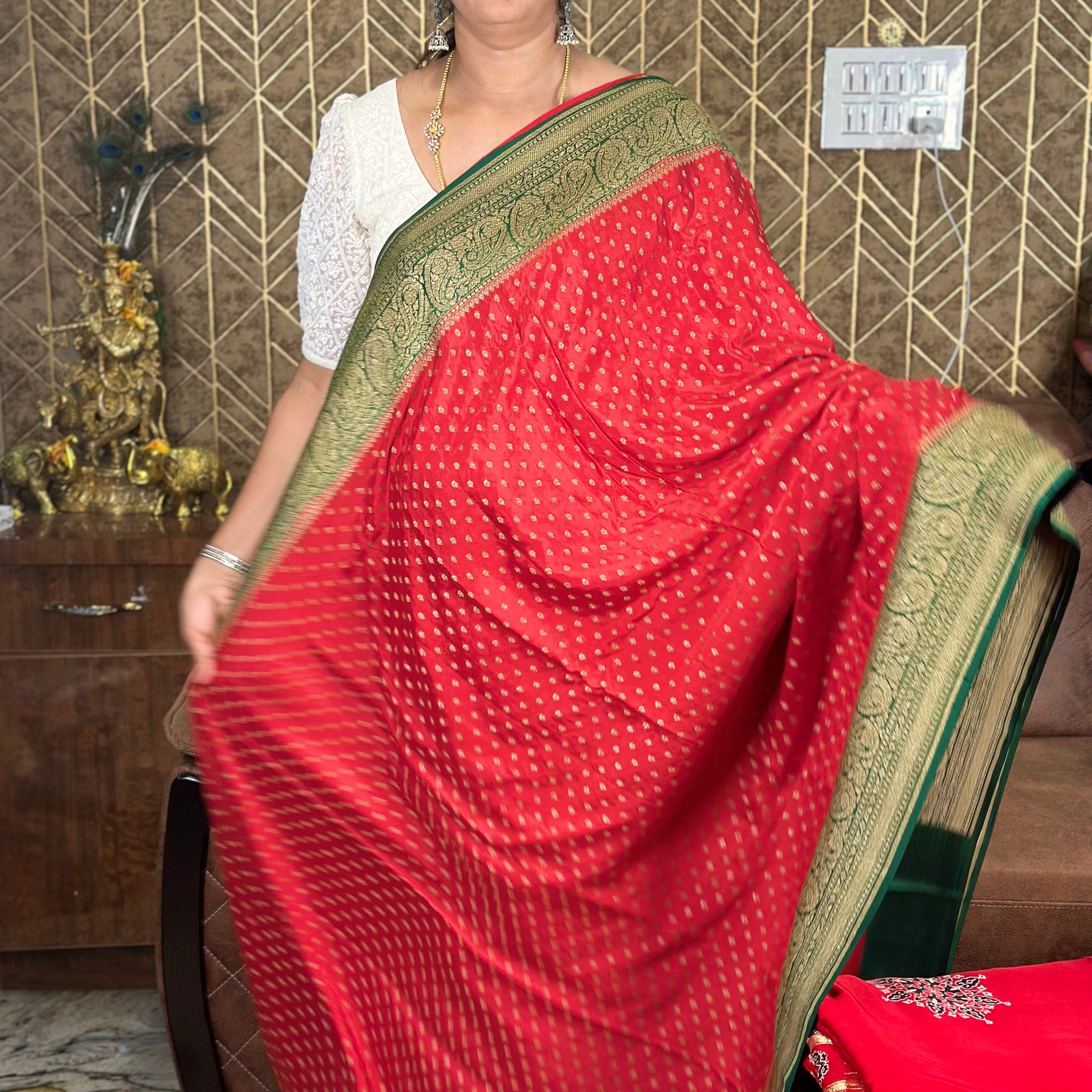 Red and green pure crepe Banaras silk sarees.