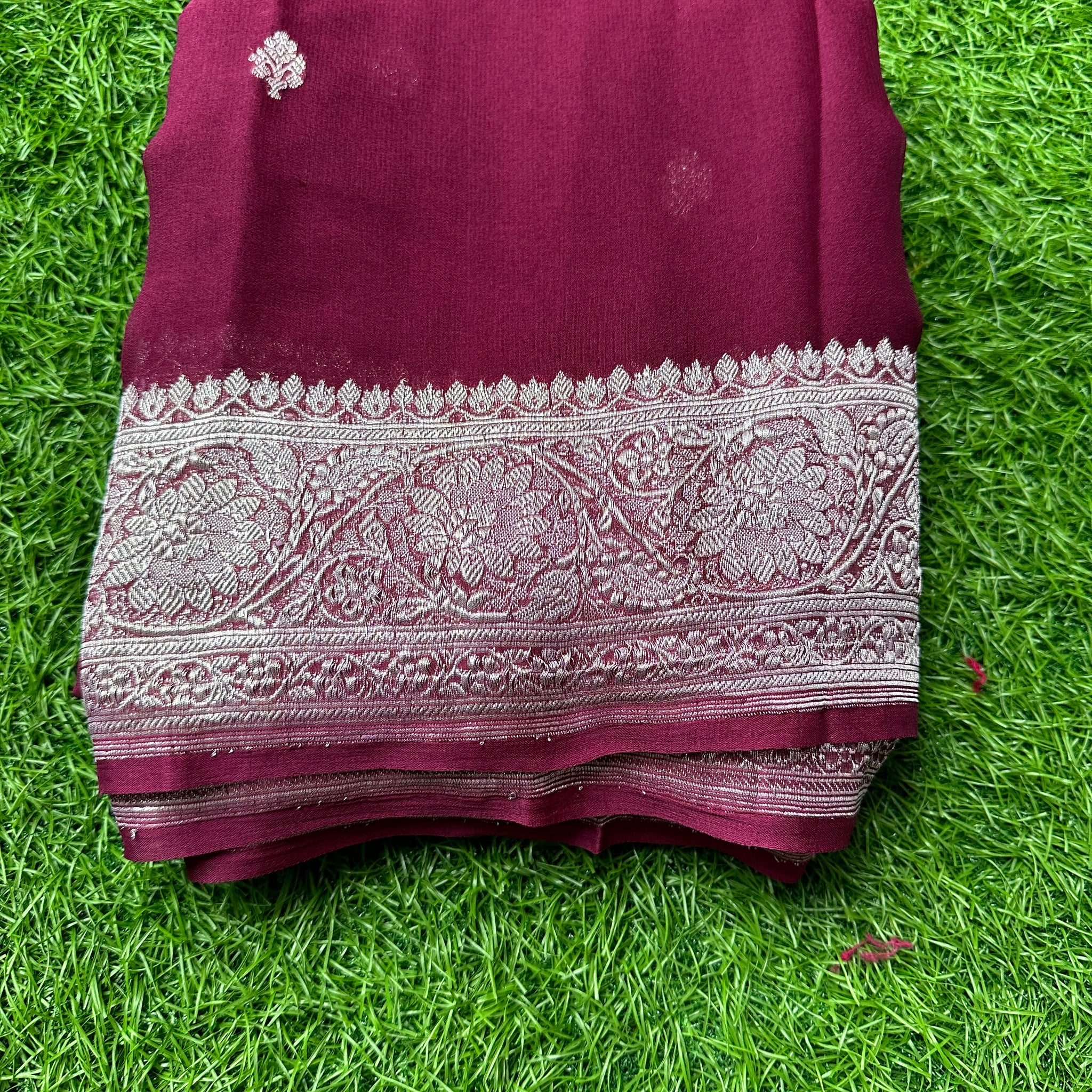 Wine pure khaddi chiffon sarees.