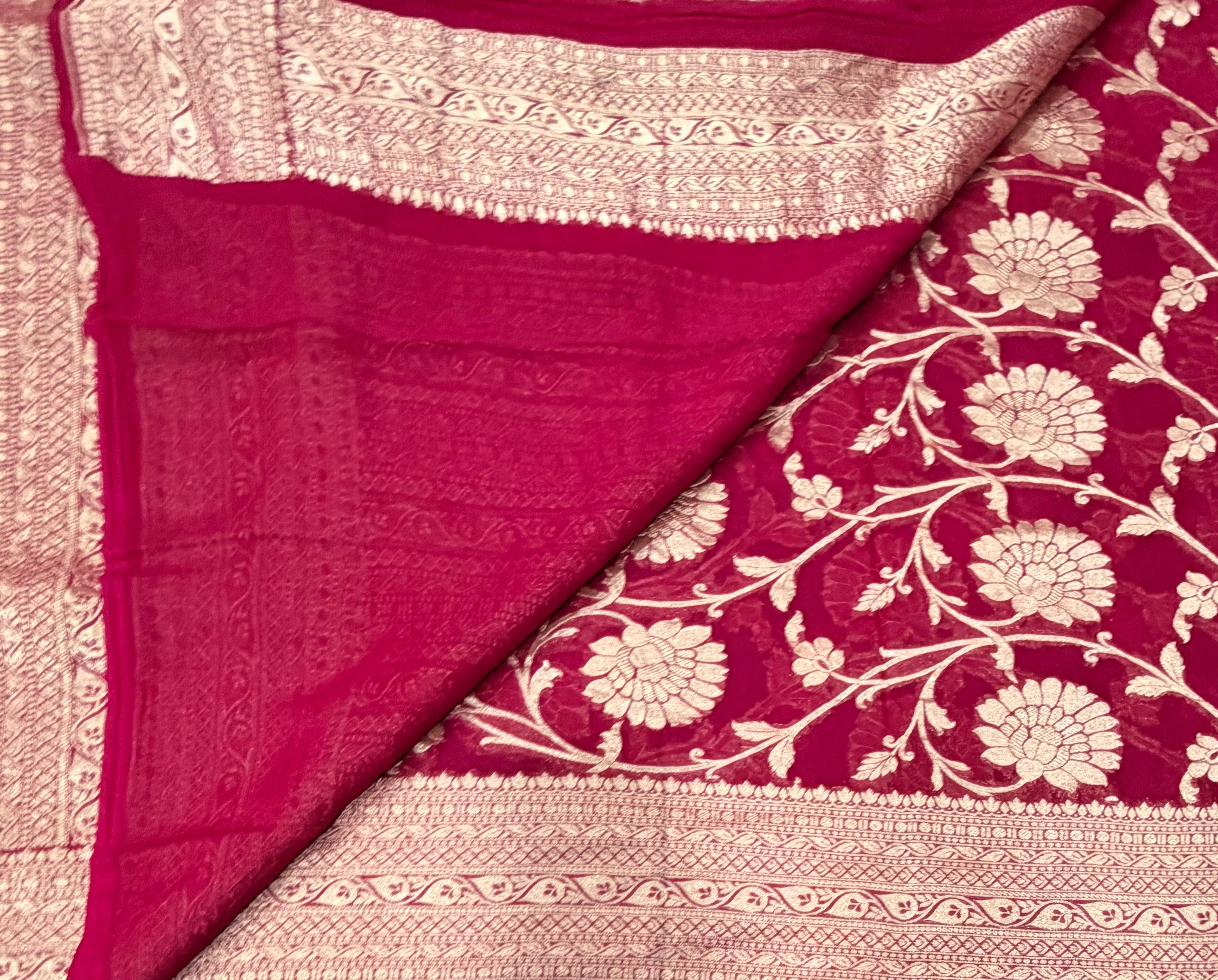 Dark Rani pink  jaal pattern pure georgette with water zari saree