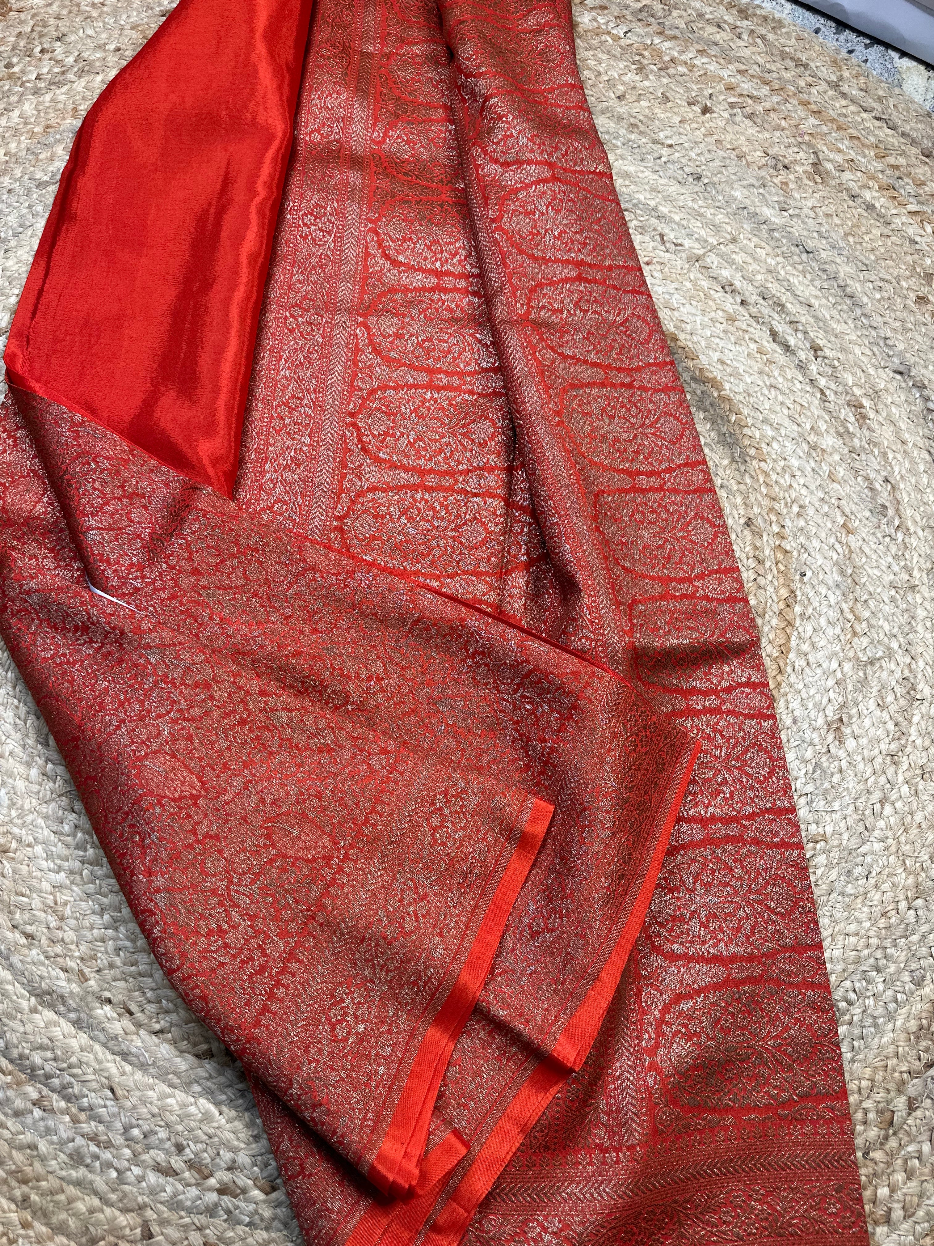 Orange brocade crepe chiffon sarees.