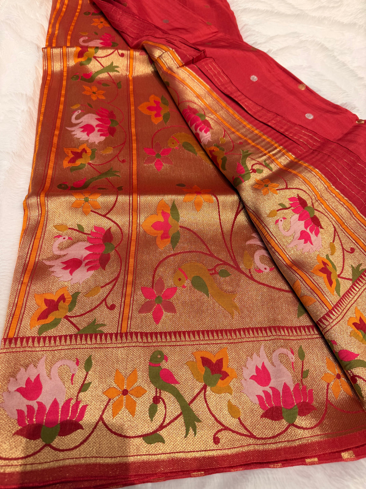 Pastel pink pure paithani swan & peacock border saree