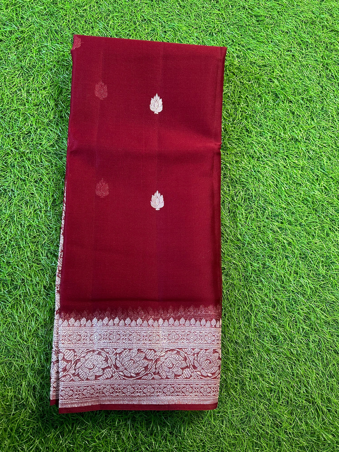 Dark bargandi pure khaddi chiffon Banarasi sarees.