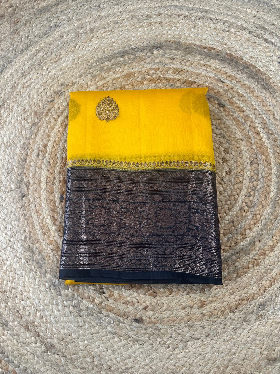 Yellow and black pure kora organza Banaras handloom silk sarees.