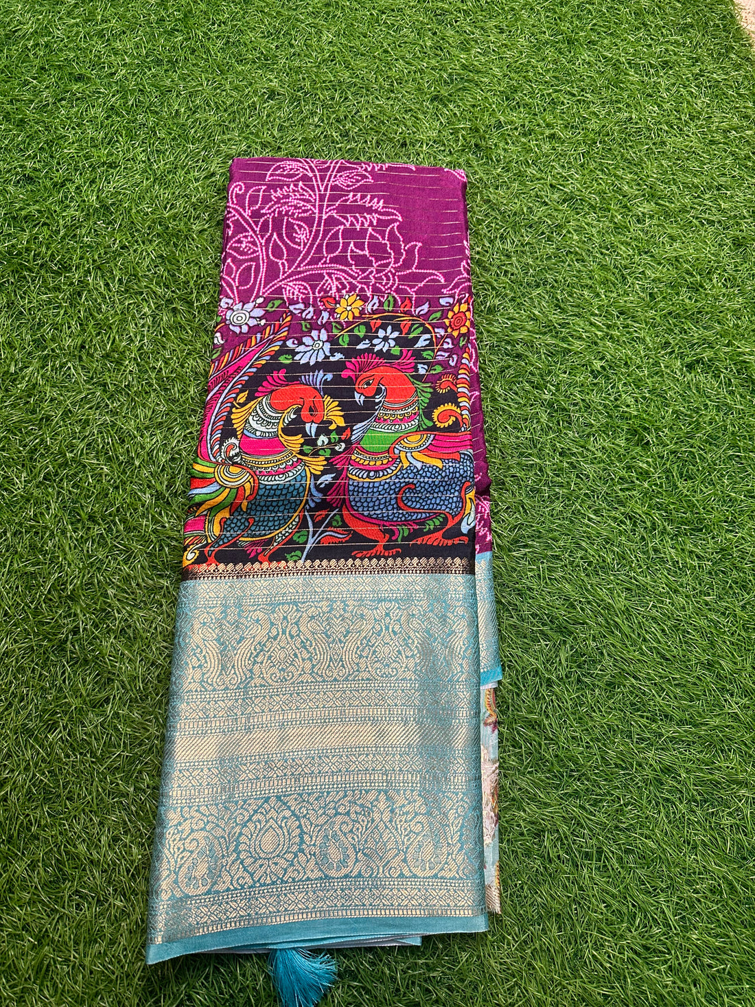 Wine and sky blue Crepe kalamkari with Kanchi border.