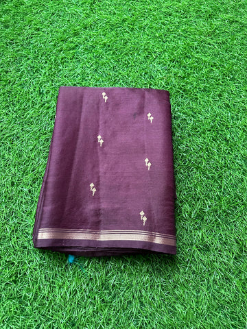 Brown semi silk.