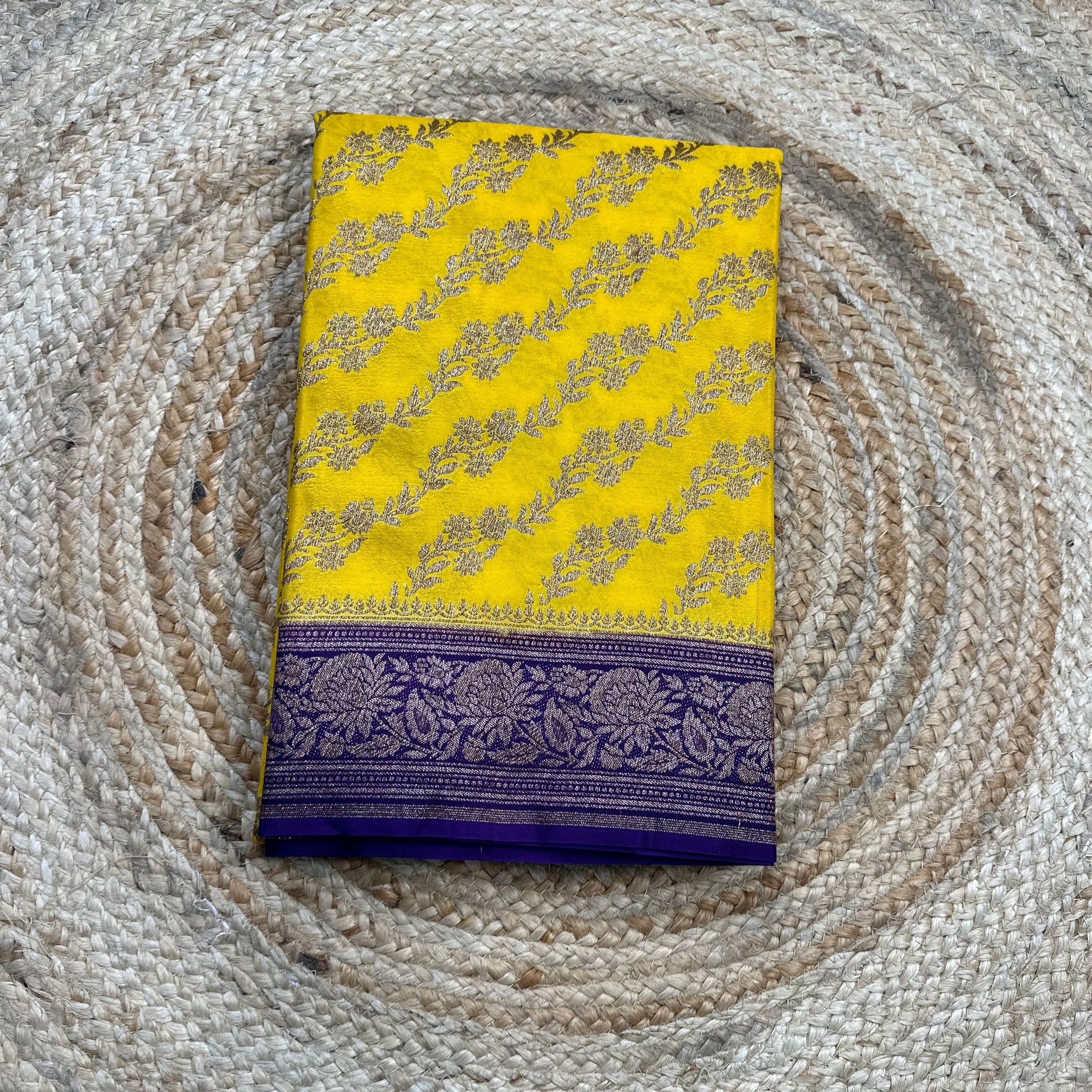 Yellow and purple crepe chiffon sarees.