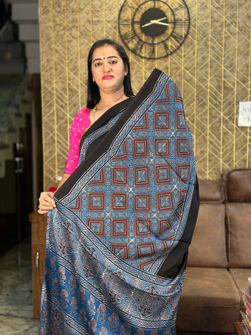 Black and blue Ajrak prints pure modal silk saree.