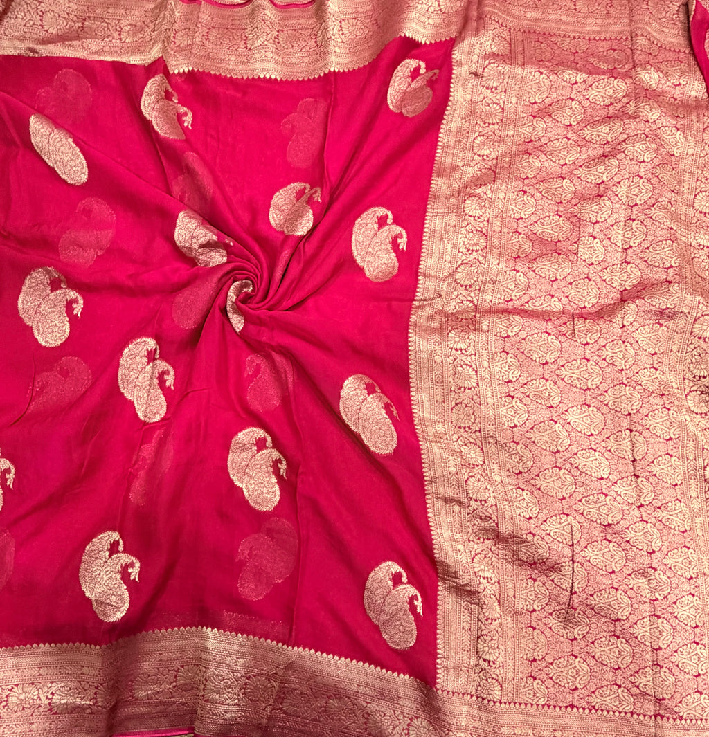 Rani pink mango Butta georgette small border saree