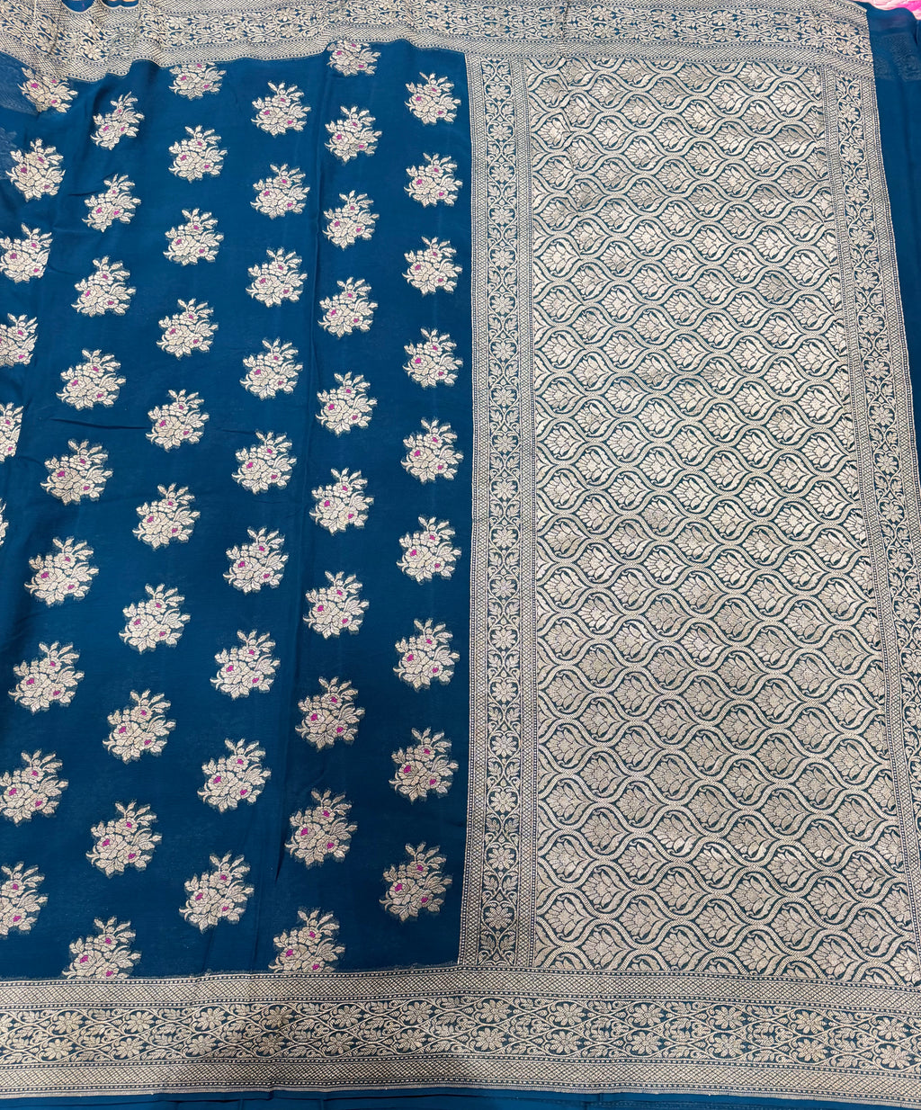 Peacock blue jaal pattern pure georgette with water zari saree