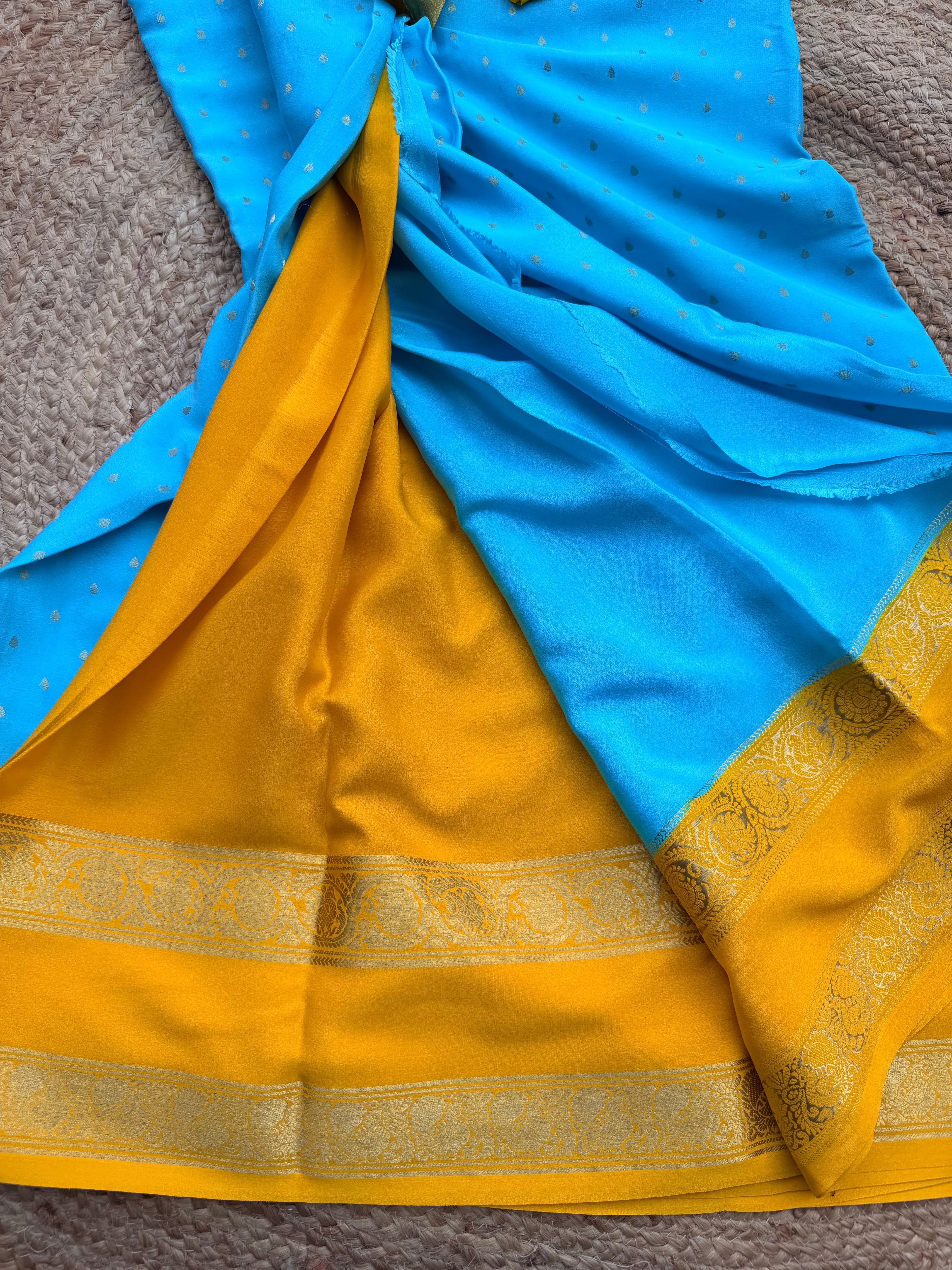 Sky blue and mango yellow 1000 butta pure crepe Mysore silk 120 gsm