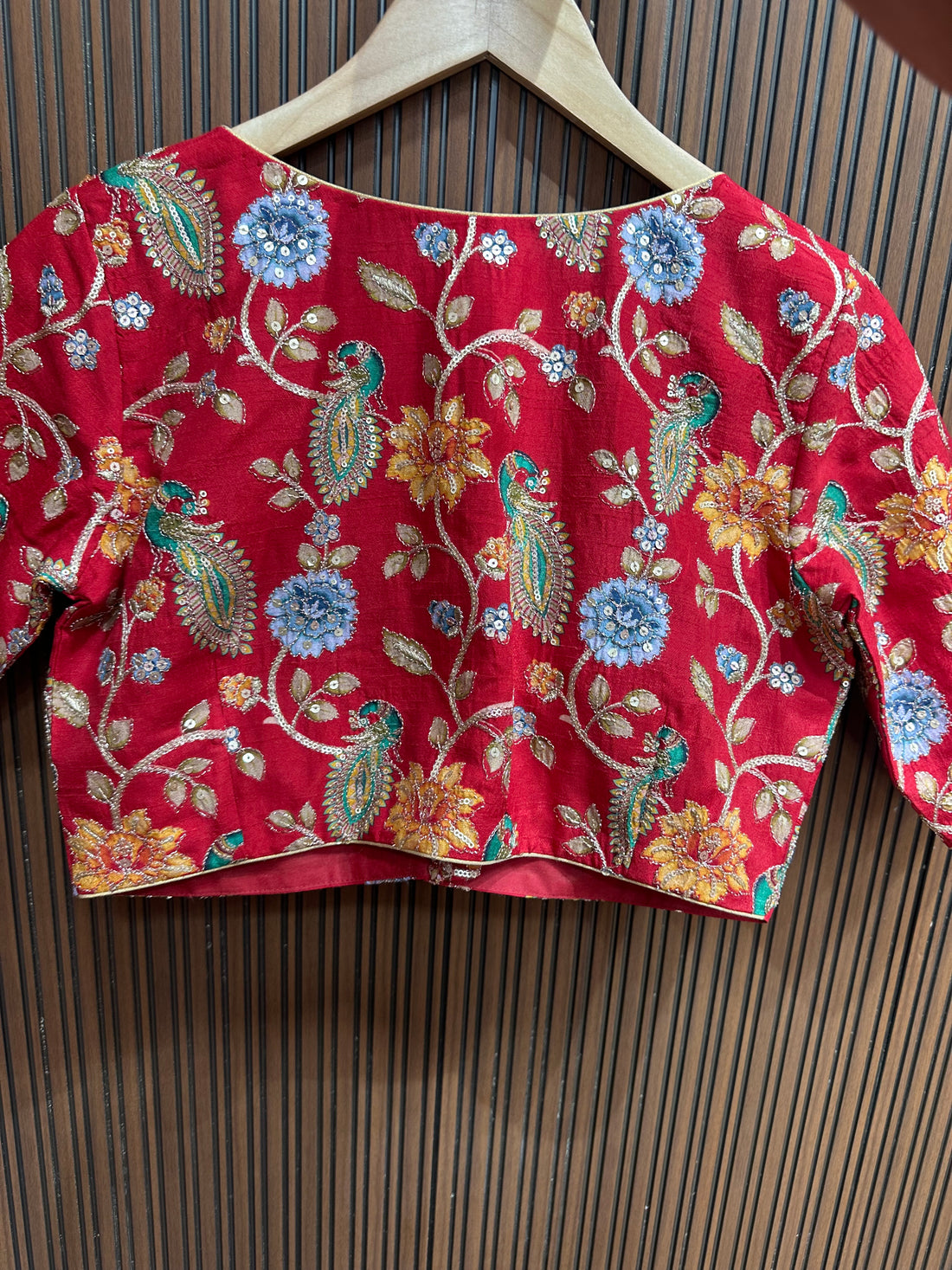 Red kalamkari stitched blouse L to XXL size margin high neck pattern.