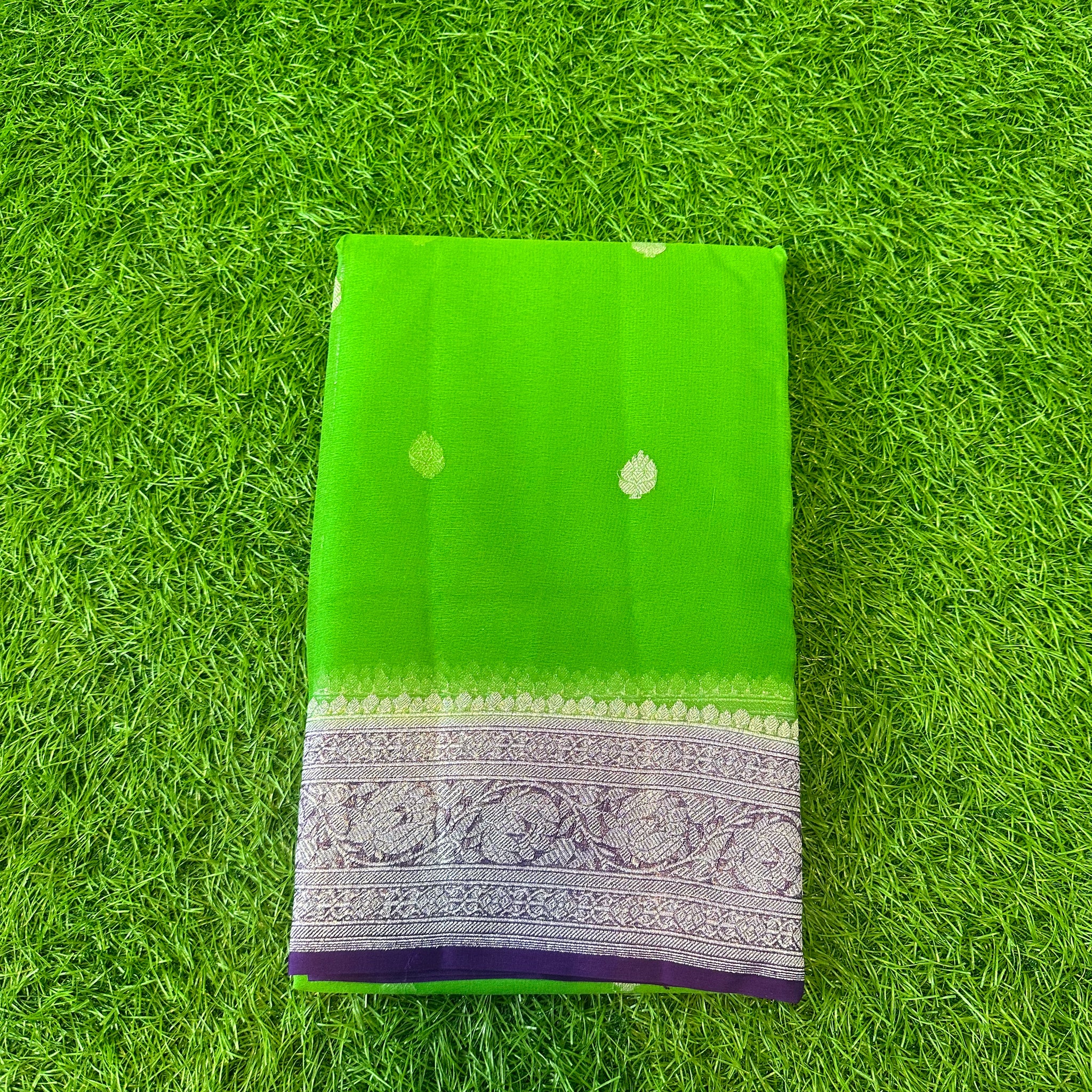 Green with purple pure khaddi chiffon Banarasi sarees.