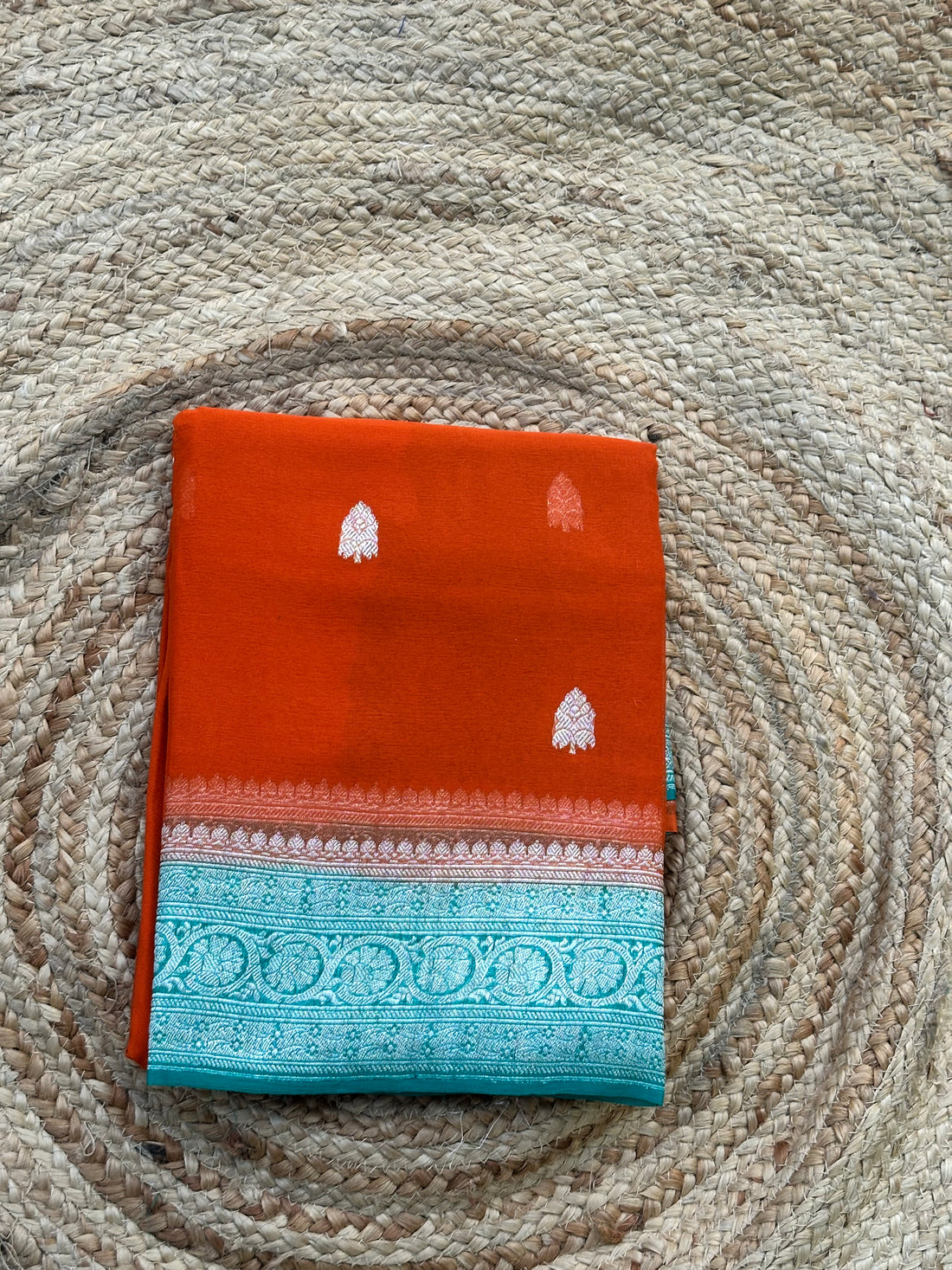 Orange and green pure khaddi chiffon silver zari woven