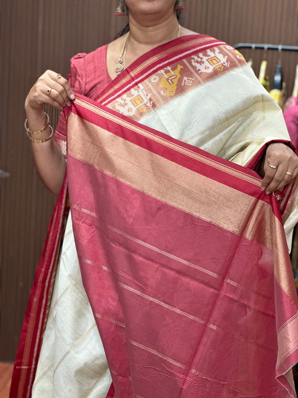 Tusser with Patola weaving Contrast border.half white with pink.