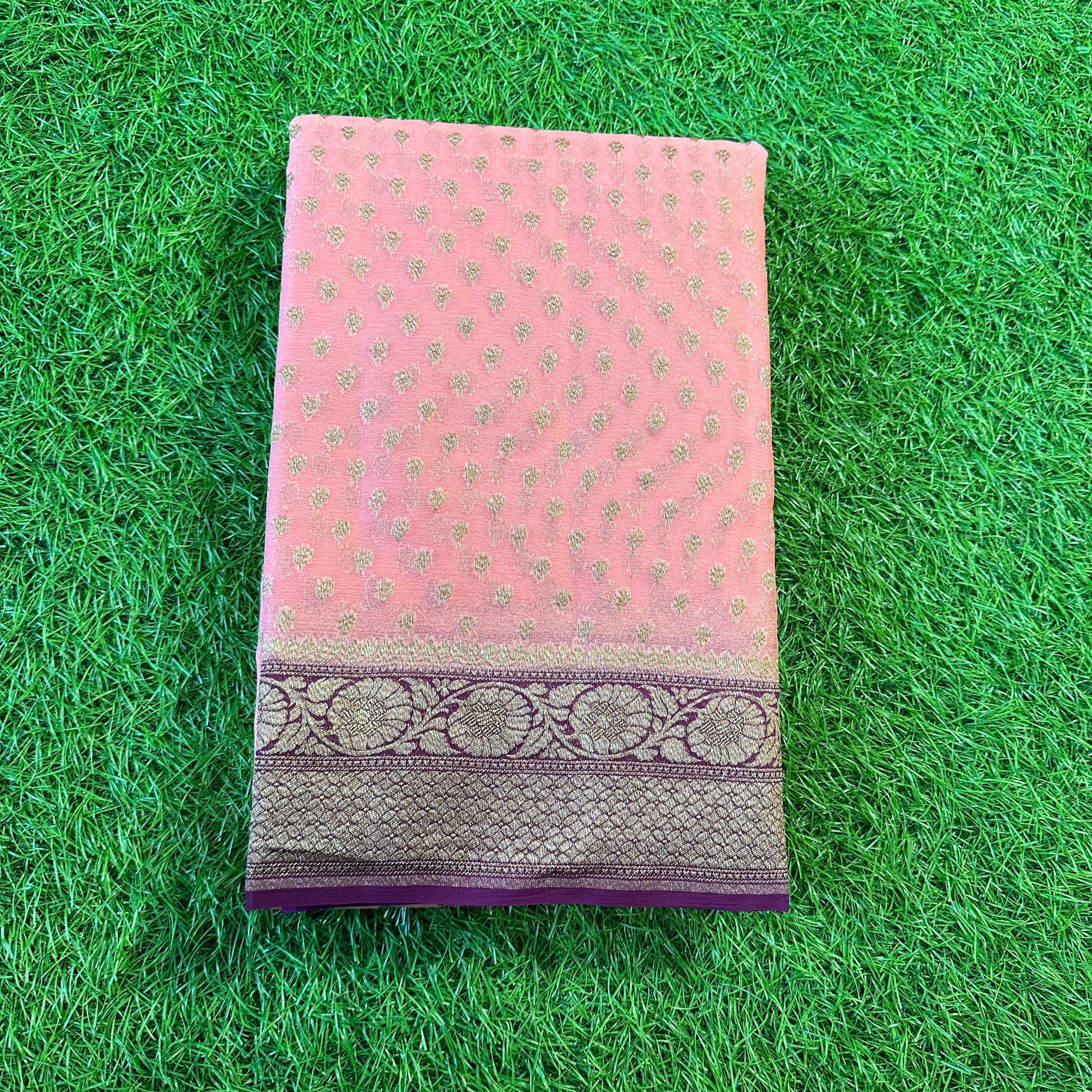 Peach with coffee brown Pure khaddi Georgette sarees.