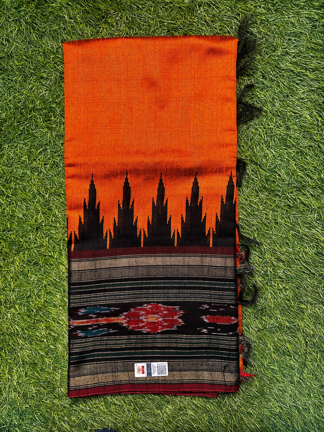 Raw silk,orange with black combination.