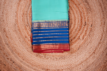 Teal blue with deep blue and pink border Pure Mysore silk 120 gsm