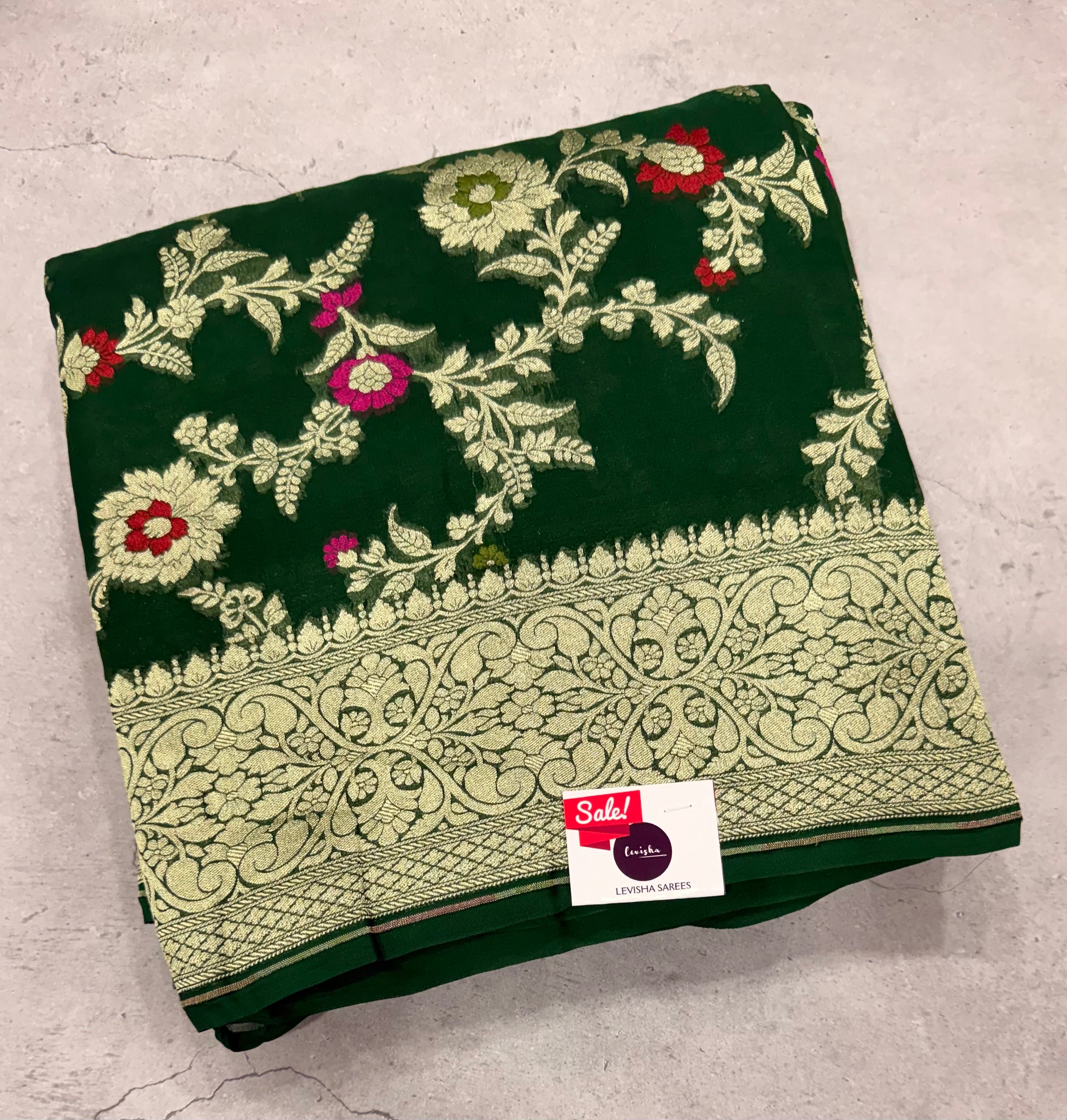 Bottle green jaal pattern pure georgette with water zari saree