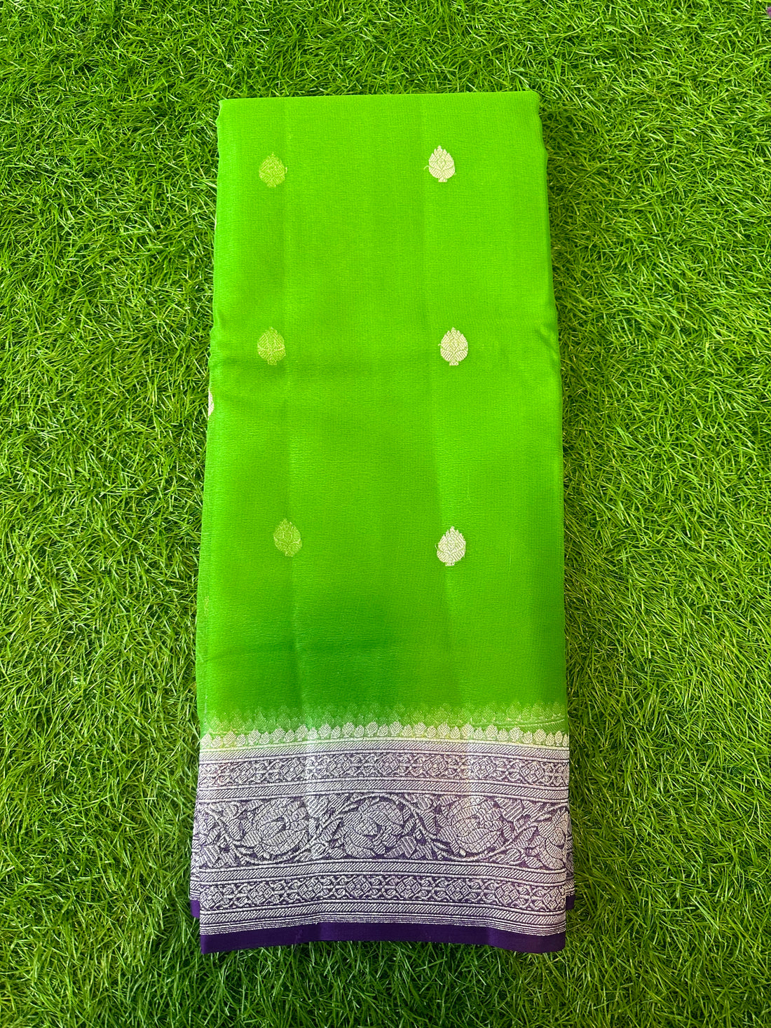 Green with purple pure khaddi chiffon Banarasi sarees.