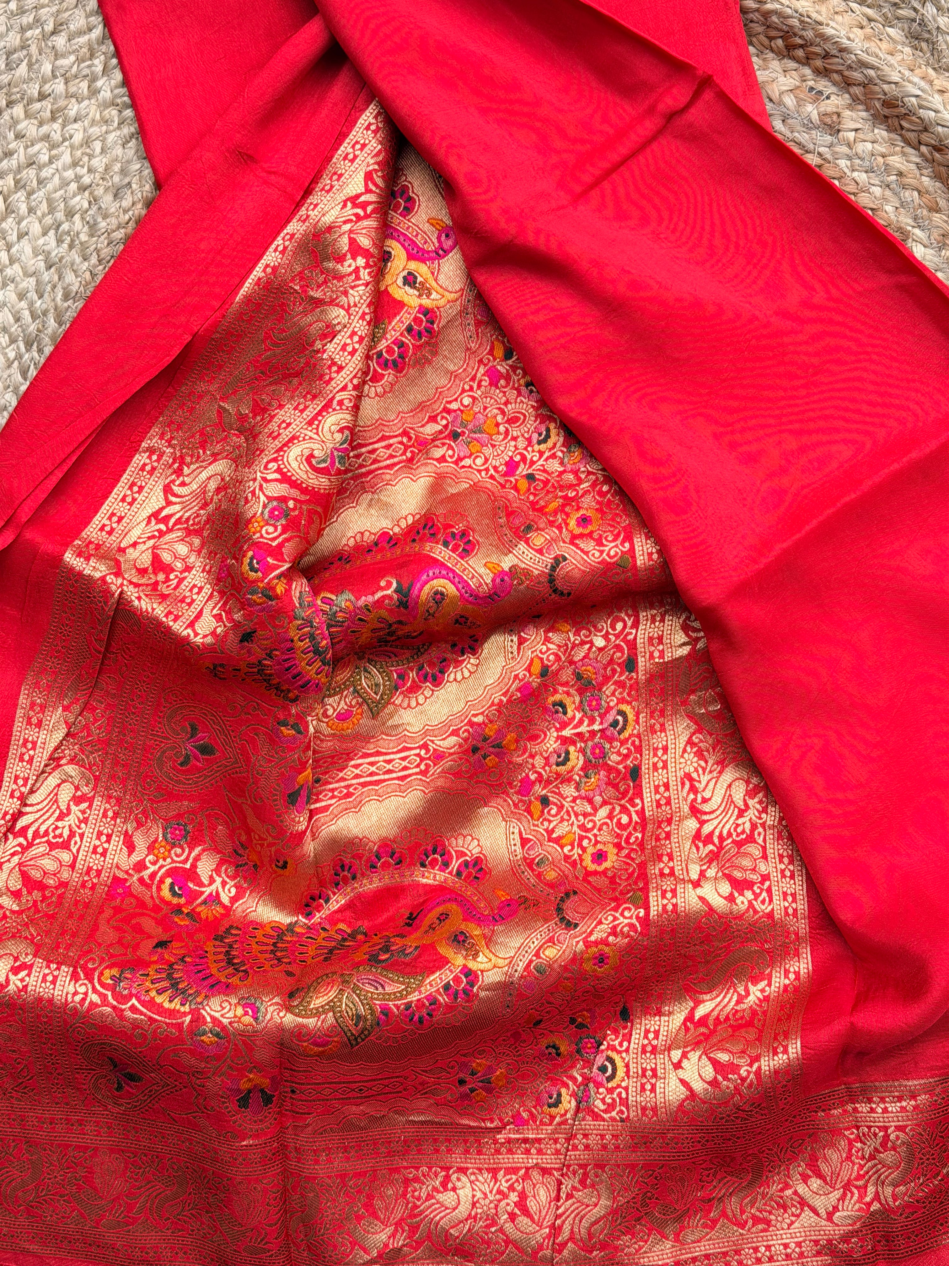 Red plain dola modal saree with meenaweaving.
