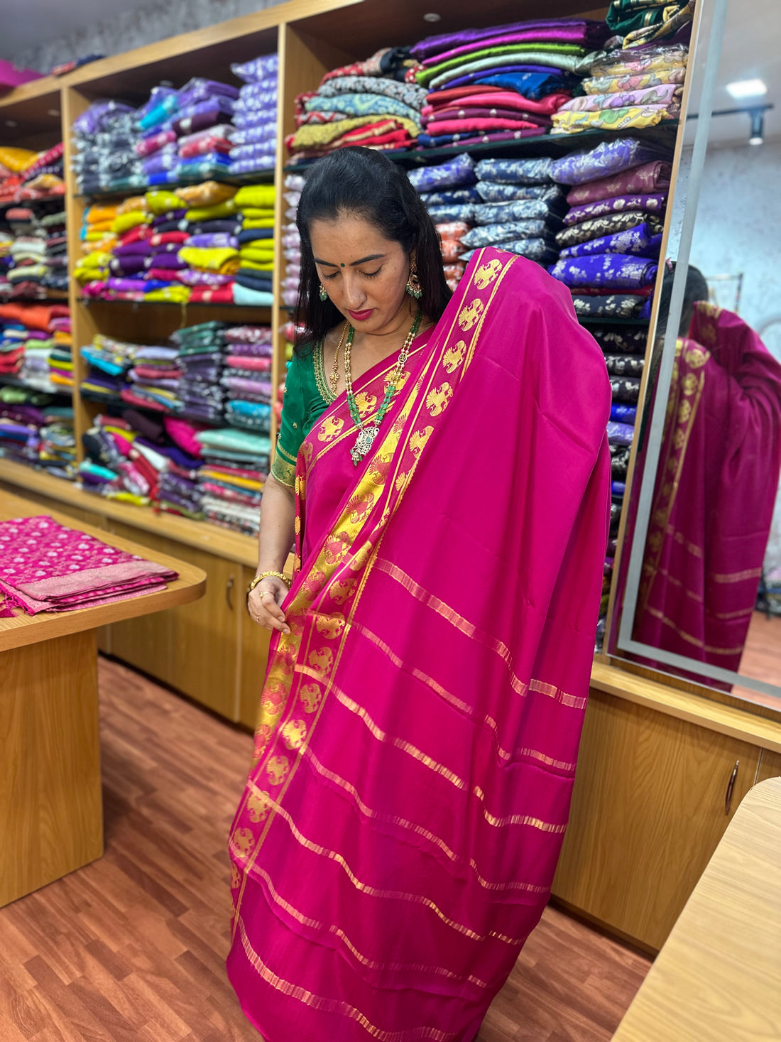 Rani pink pure crepe Banaras silk sarees. Gandaberunda border