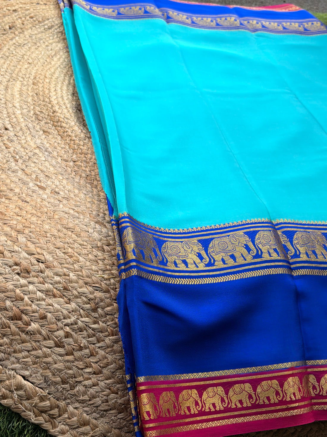 Mysuru Silk Crepe- Elephant 3 D Border (120 gsm) Sky blue with royal blue and pink border