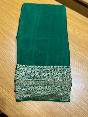 Deep green self colour pure crepe Banaras silk sarees