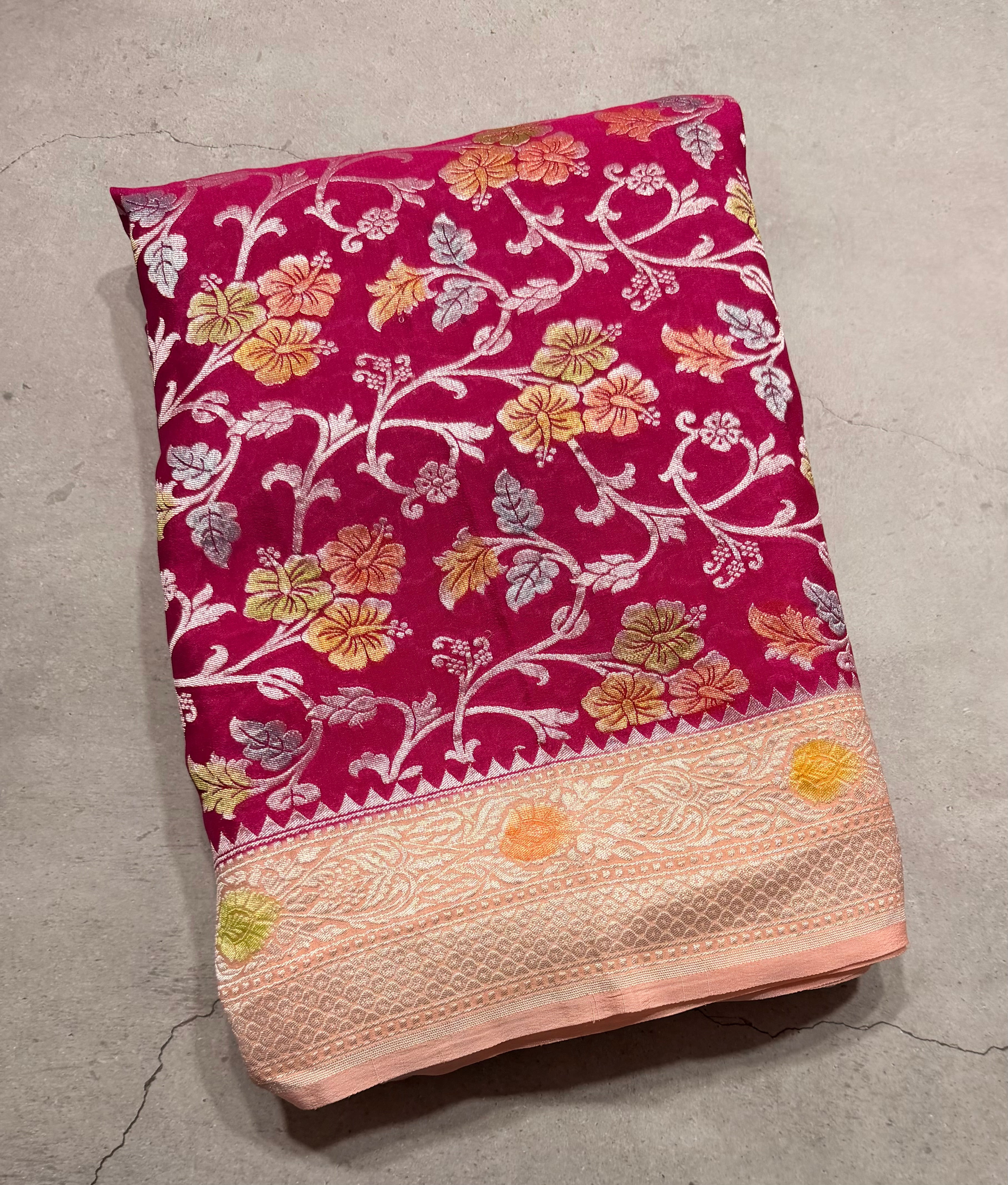Rani pink jaal pattern pure georgette with water zari saree