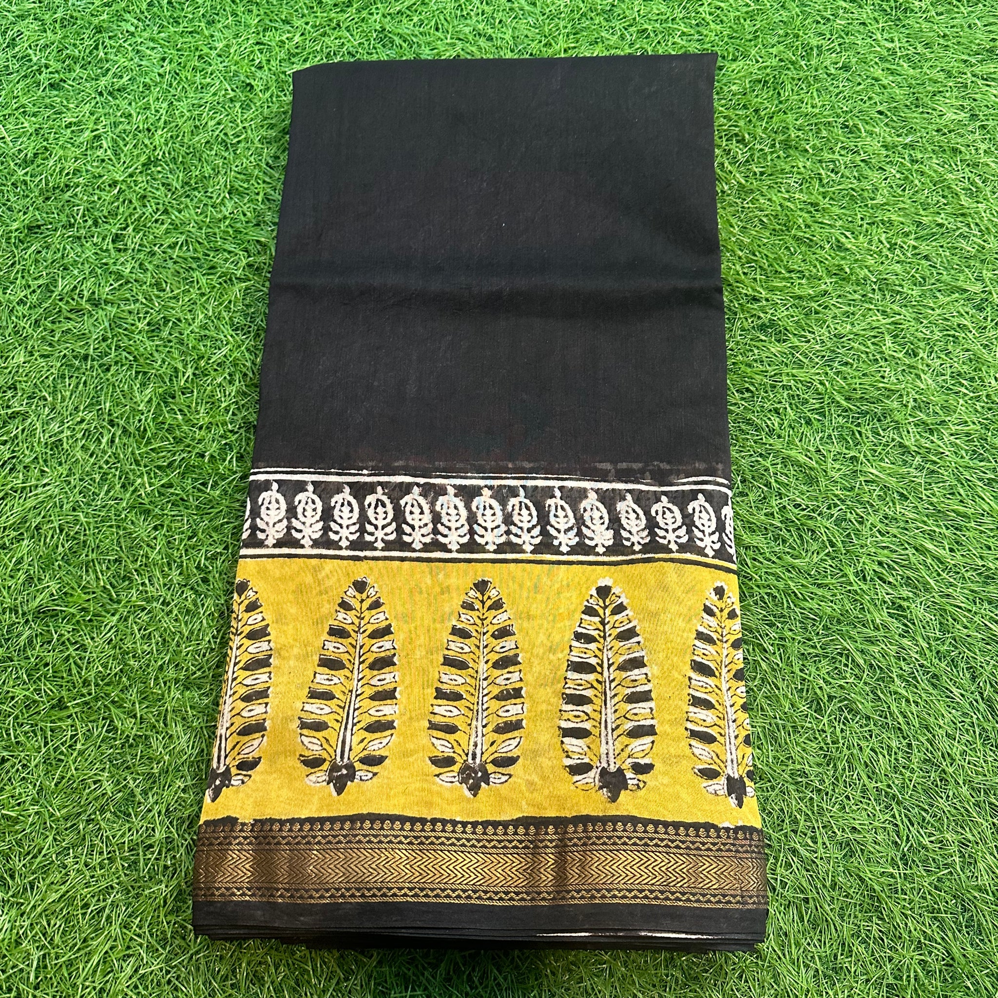 Black and mustard Maheshwari silk.