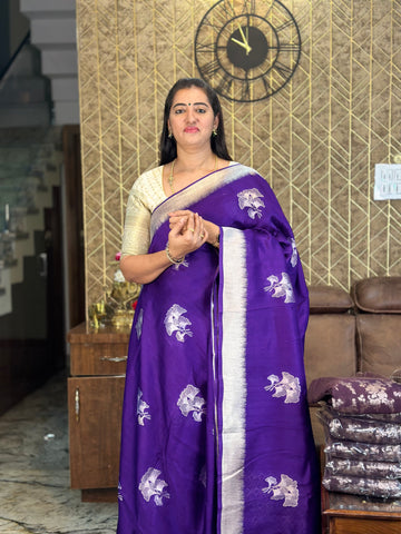 Purple dola silk with silver border.