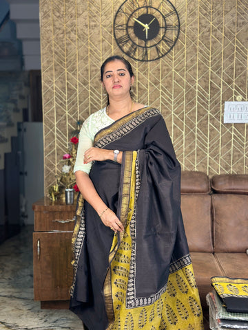 Black with mustard Maheshwari silk.