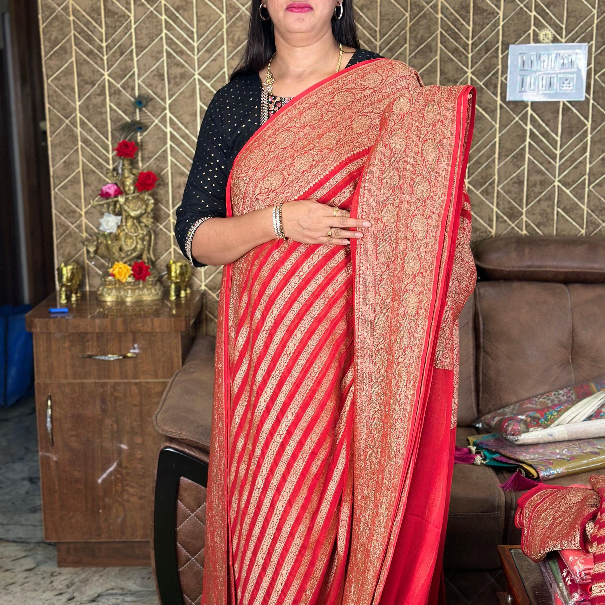 Hot red pure khaddi Georgette in stripes.