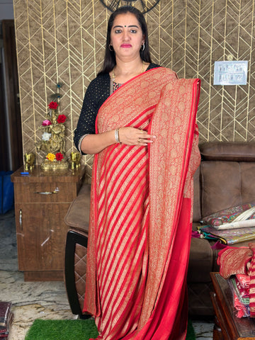 Hot red pure khaddi Georgette in stripes.