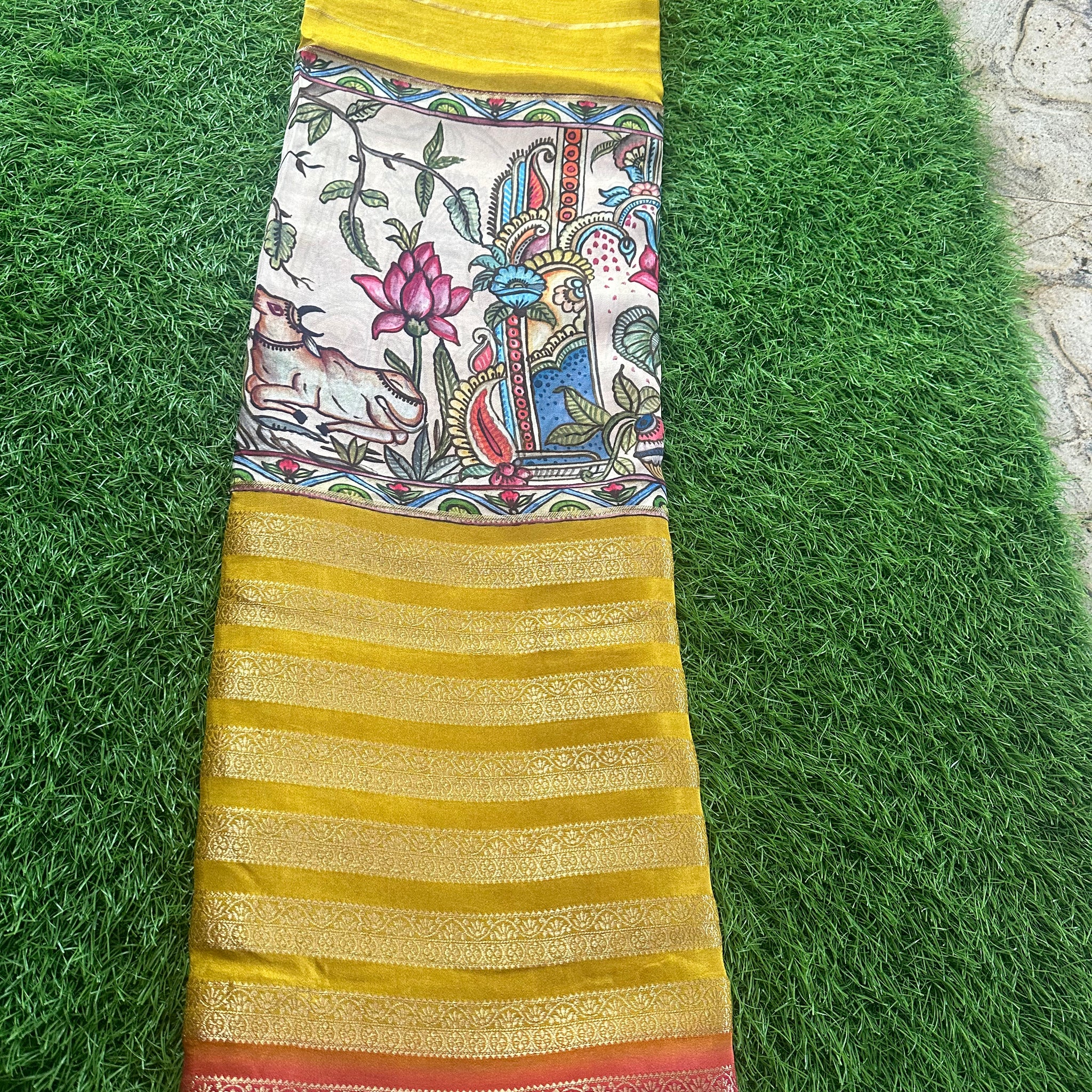 Mustard with red kalamkari horizontal stripes semi crepe.