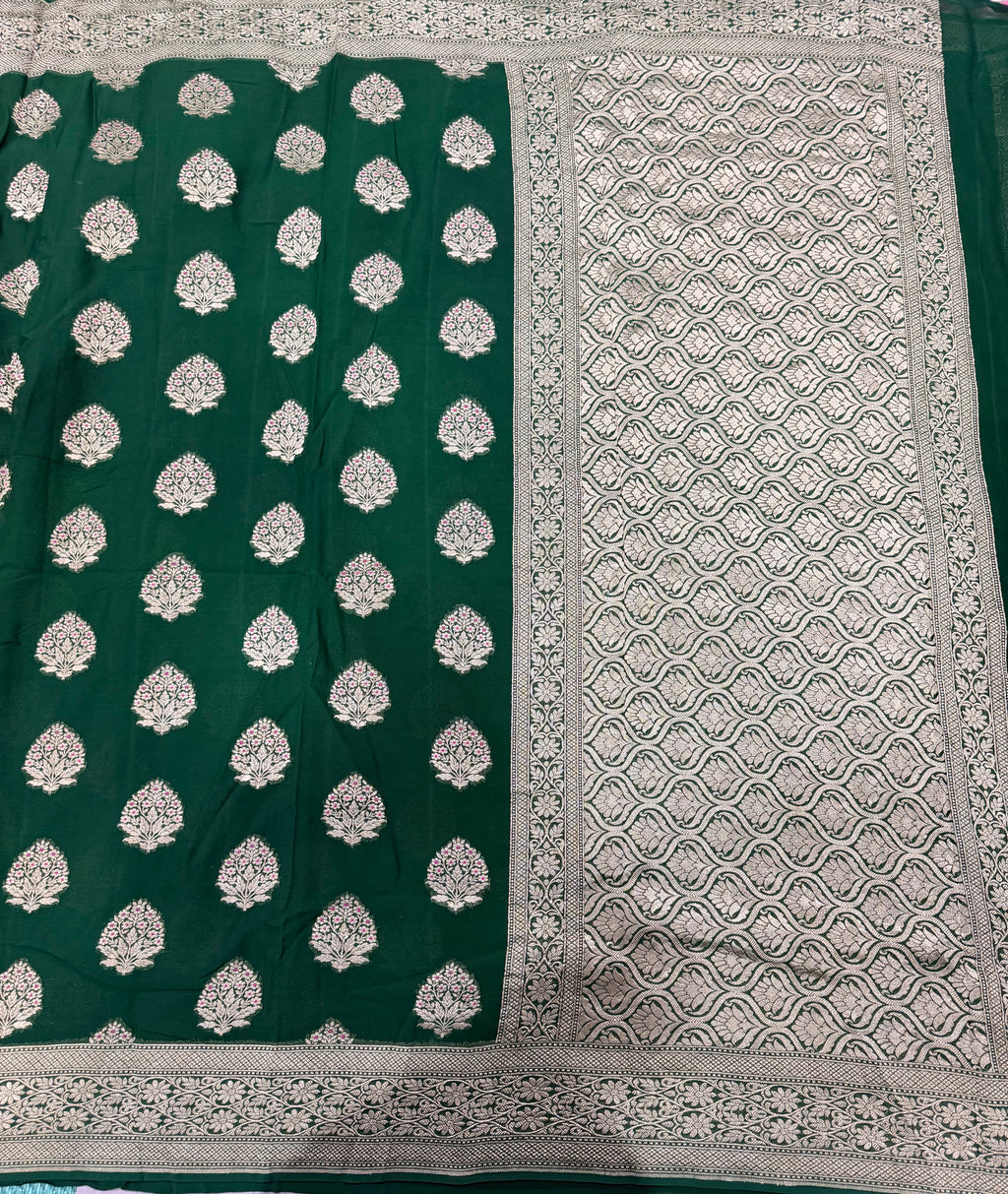 Bottle green pure georgette with water zari saree