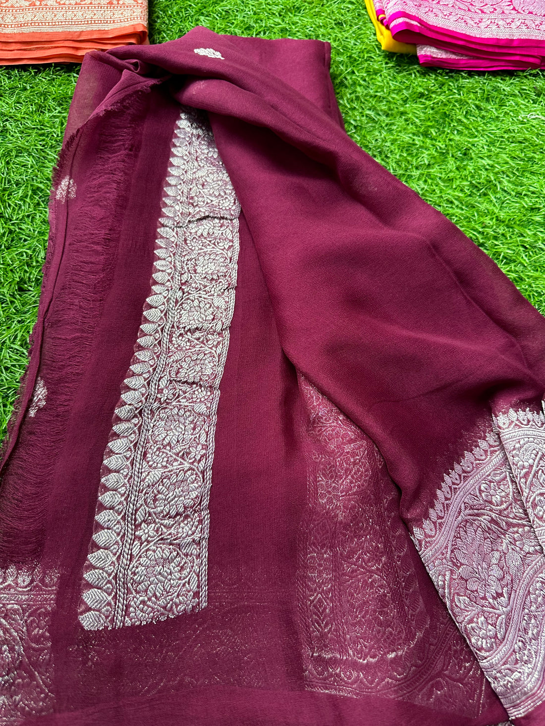 Wine pure khaddi chiffon sarees.